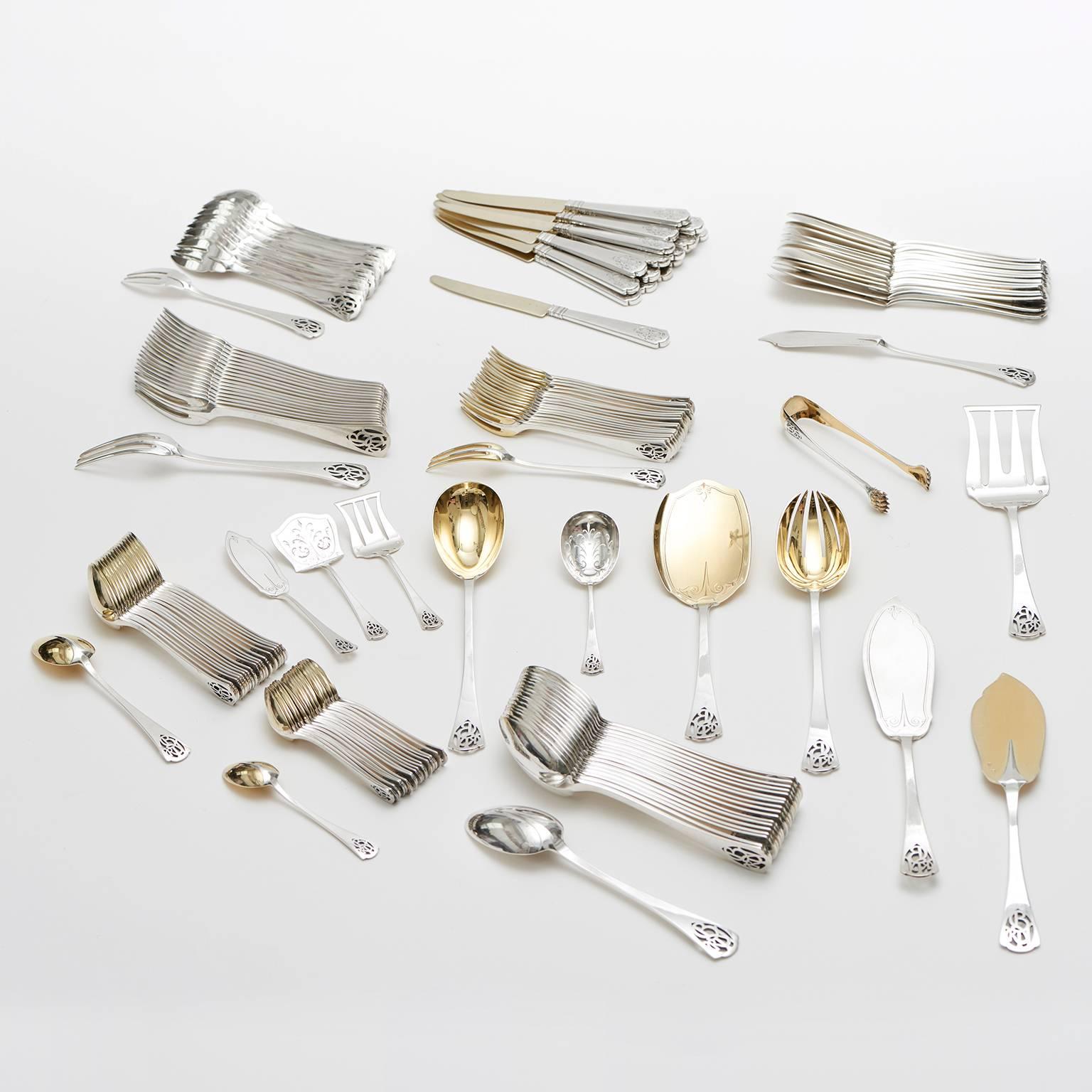 Circa 1920s, Sterling, Puiforcat for Henin and Cie, Paris, France.  This one-of-a-kind Art Deco sterling flatware set was made by Puiforcat for the renowned Parisian retailer Henin and Cie. Redolent of the unapologetic opulence of the roaring