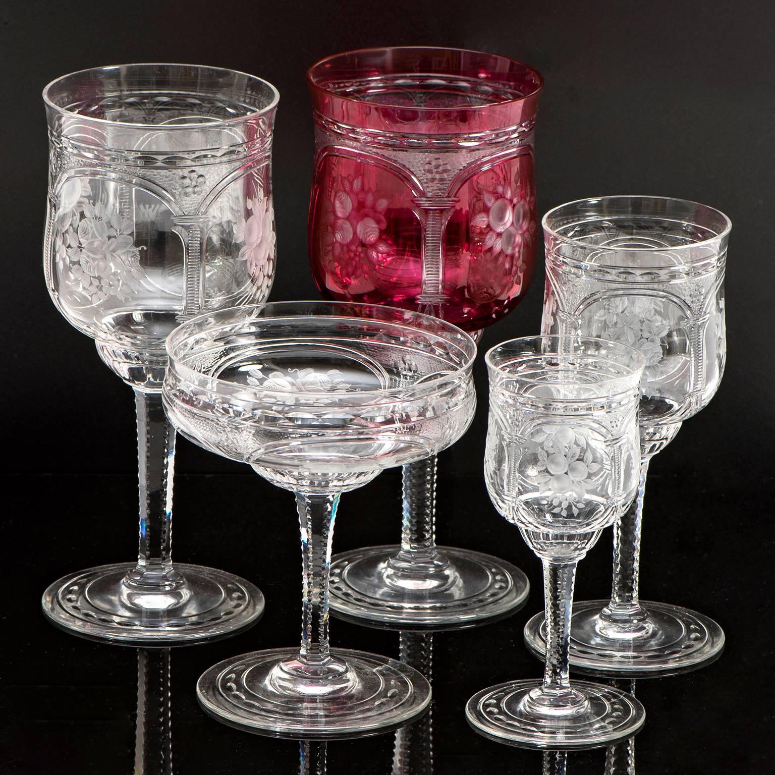 Circa 1900, by Baccarat, French. These magnificent late nineteenth-century crystal goblets by Baccarat showcase the superb skill and craftsmanship of France's finest glass house. Each of the 57 pieces is exquisitely detailed with neoclassical