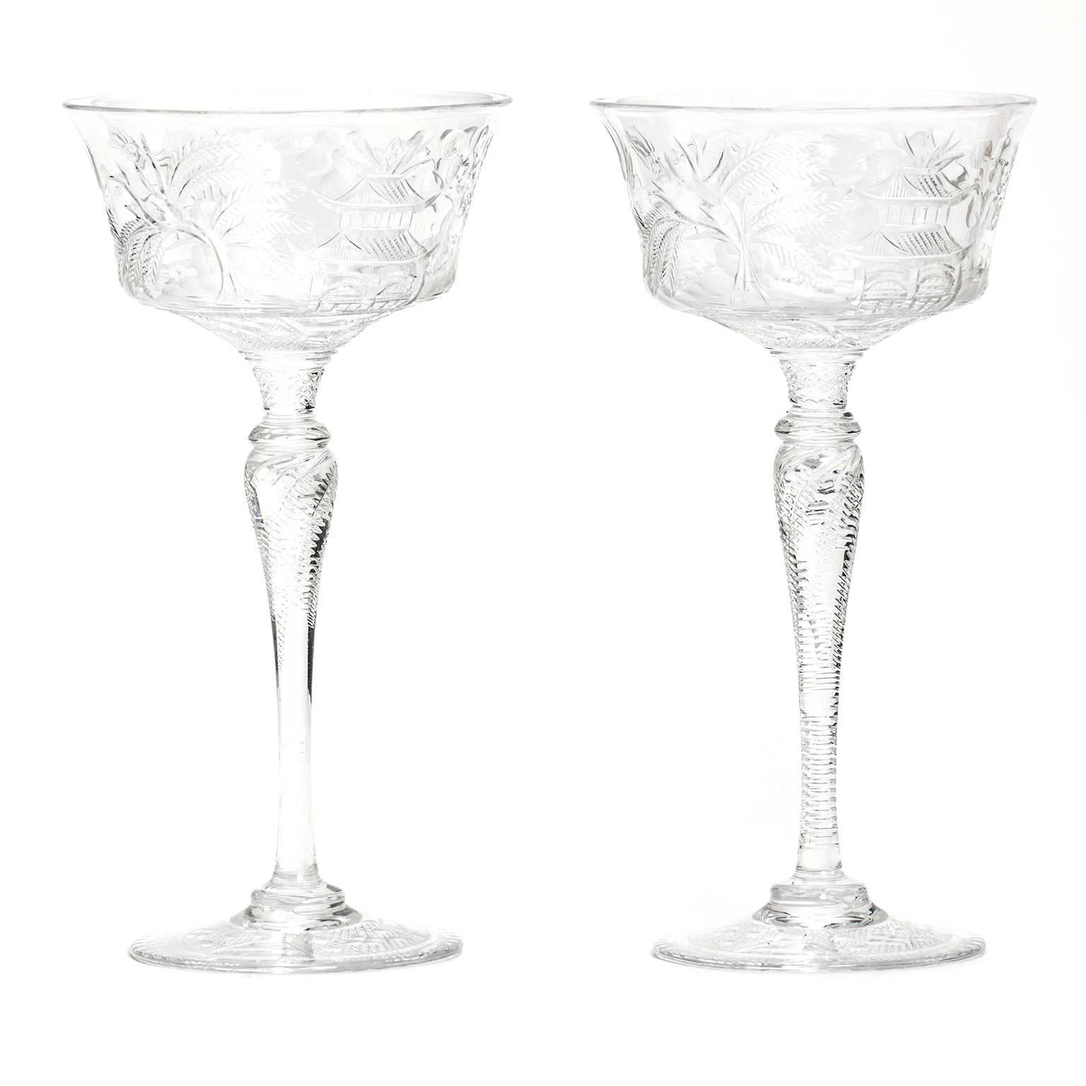 Circa 1910, Stevens & Williams, England. These outstanding champagne or cocktail glasses by Stevens and Williams, in the rare and desirable “Willow” pattern, are ornamented with a beautiful chinoiserie scene featuring pagodas and ships. Splendidly