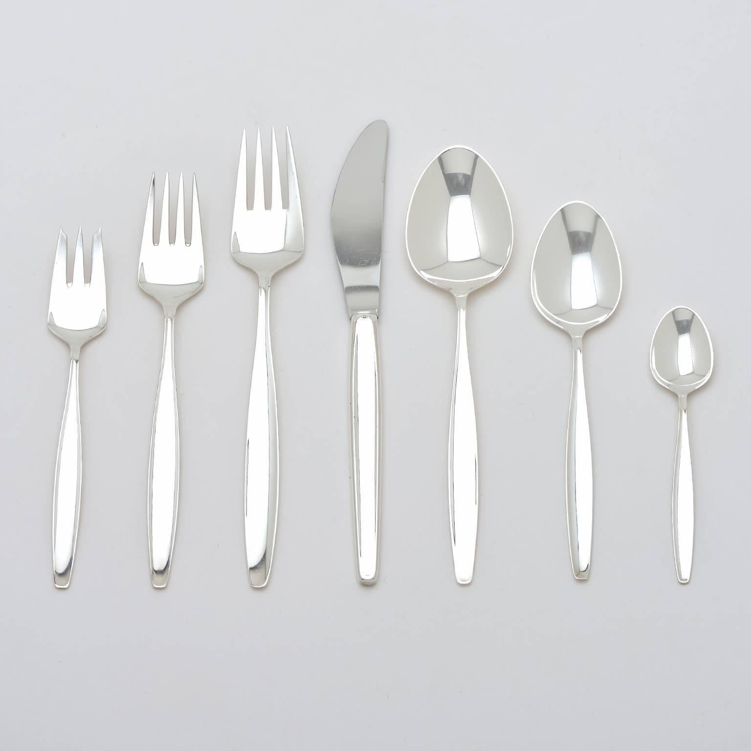 Circa 1950s, Sterling, Georg Jensen, Denmark.  Cypress pattern, by Tias Eckhoff (circa 1954).  This sleekly sophisticated set of Georg Jensen “Cypress” flatware complements the style of any décor or table service. At 92 pieces, this service for 12