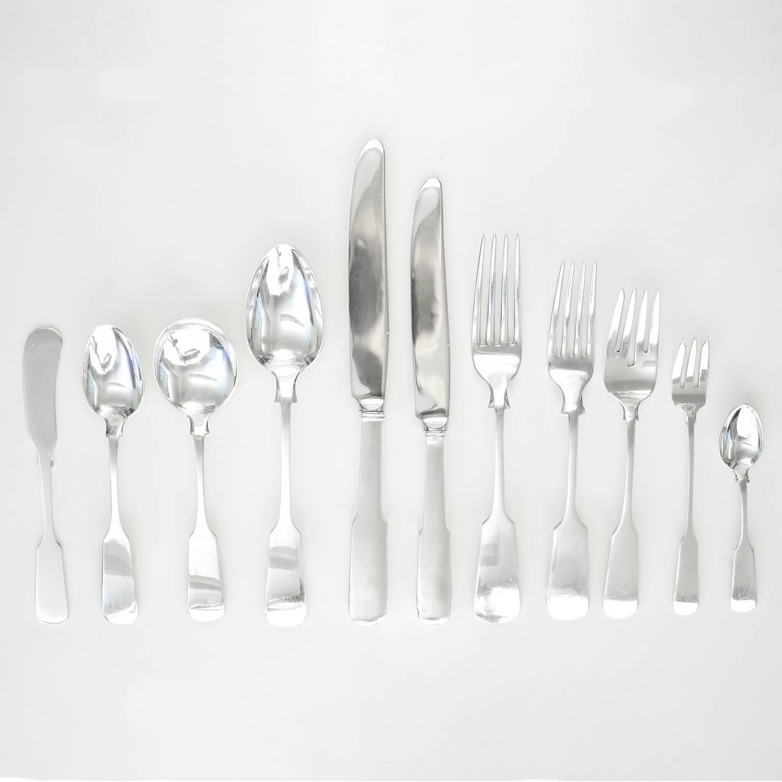 Circa 1950s, by Gorham, American. 131 piece set. This lovely sterling flatware service for 12 in a classic fiddle motif features the elegant architectural lines American colonial design was known for. Fiddle pattern has become a modern mainstay; the