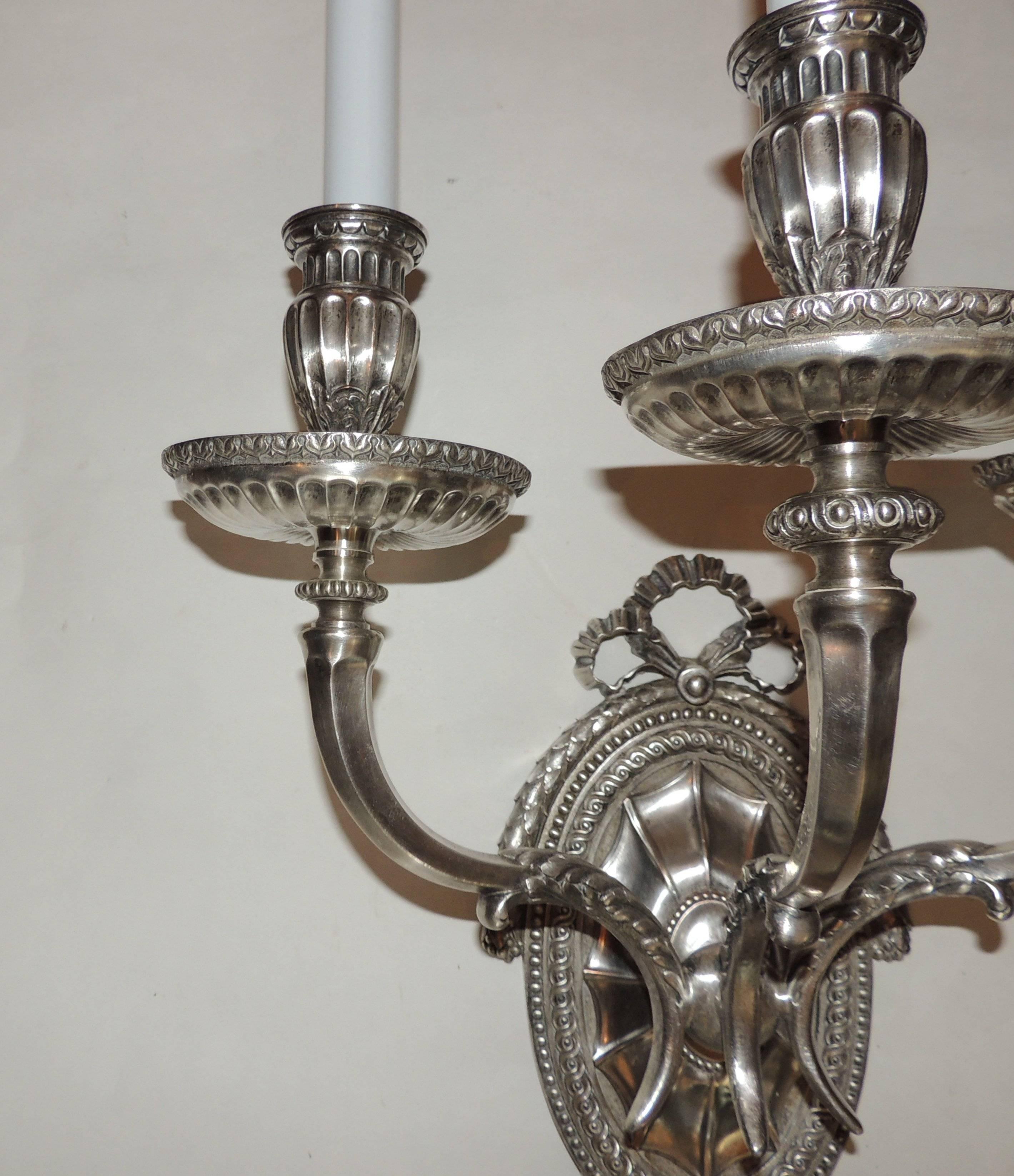 Elegant Pair Caldwell Silvered Bronze Three-Arm Filigree Bow Regency Sconces In Good Condition In Roslyn, NY