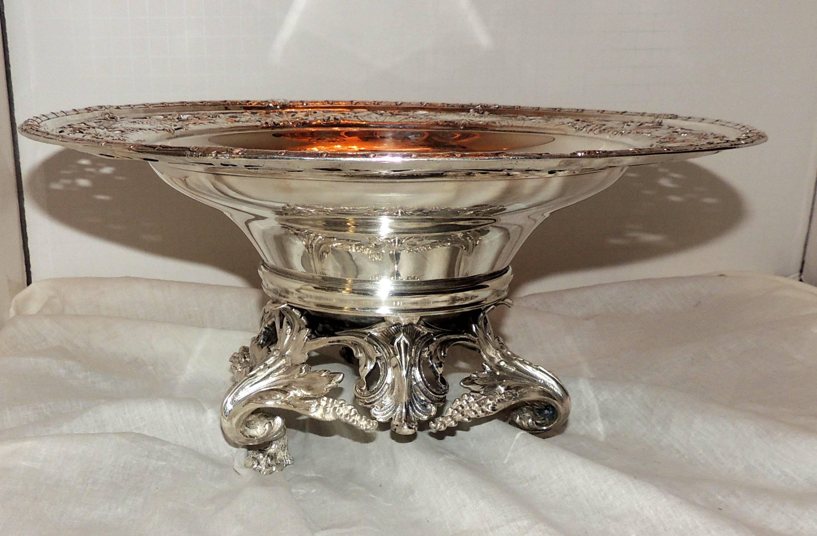 Redlich & Co. sterling silver footed floral pierced bowl centerpiece.
Beautiful footed pedestal with floral and scrolls.

Measures: 17" W x 7" H.

circa 1920s.
Approximately 62 troy oz.
No Monograms.
