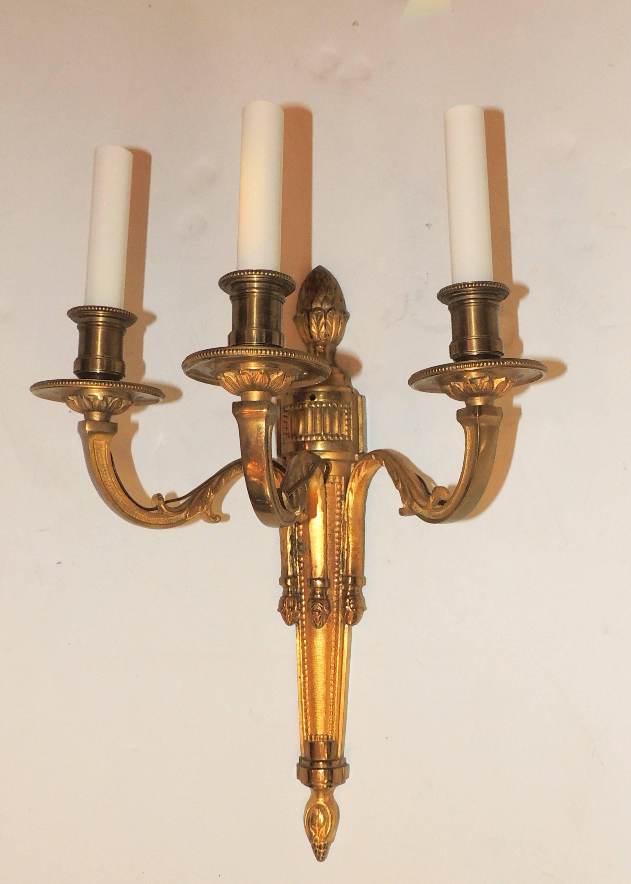 Wonderful pair of neoclassical urn top three-arm sconces with fine etched detail to bobeches, newly rewired.
In the manner of Caldwell



Measures: 19