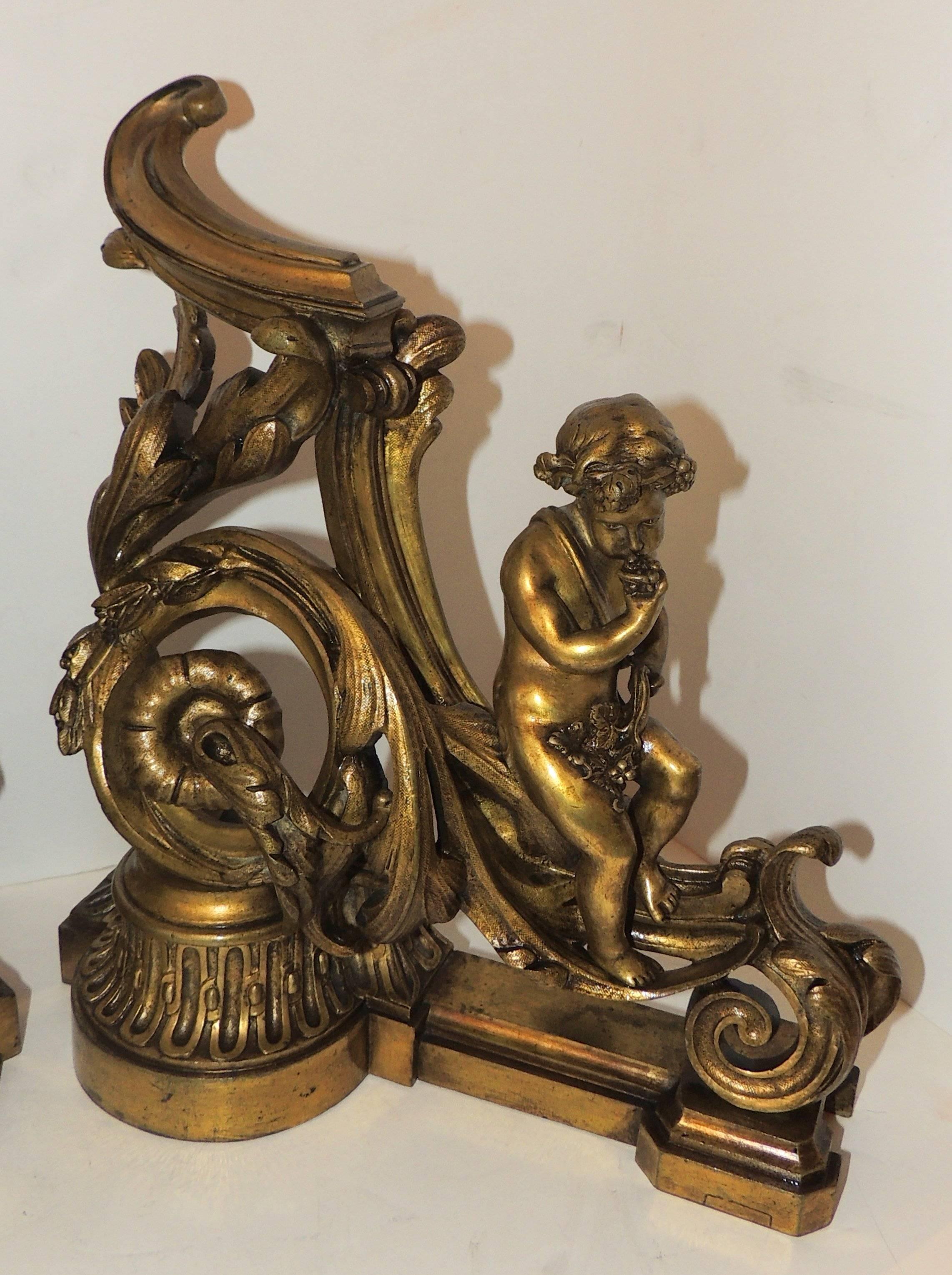 Wonderful French gilt bronze cherub putti fireplace fire place Chenets andirons.

Measures: 12" W x 13.5 " H x 6 " D.