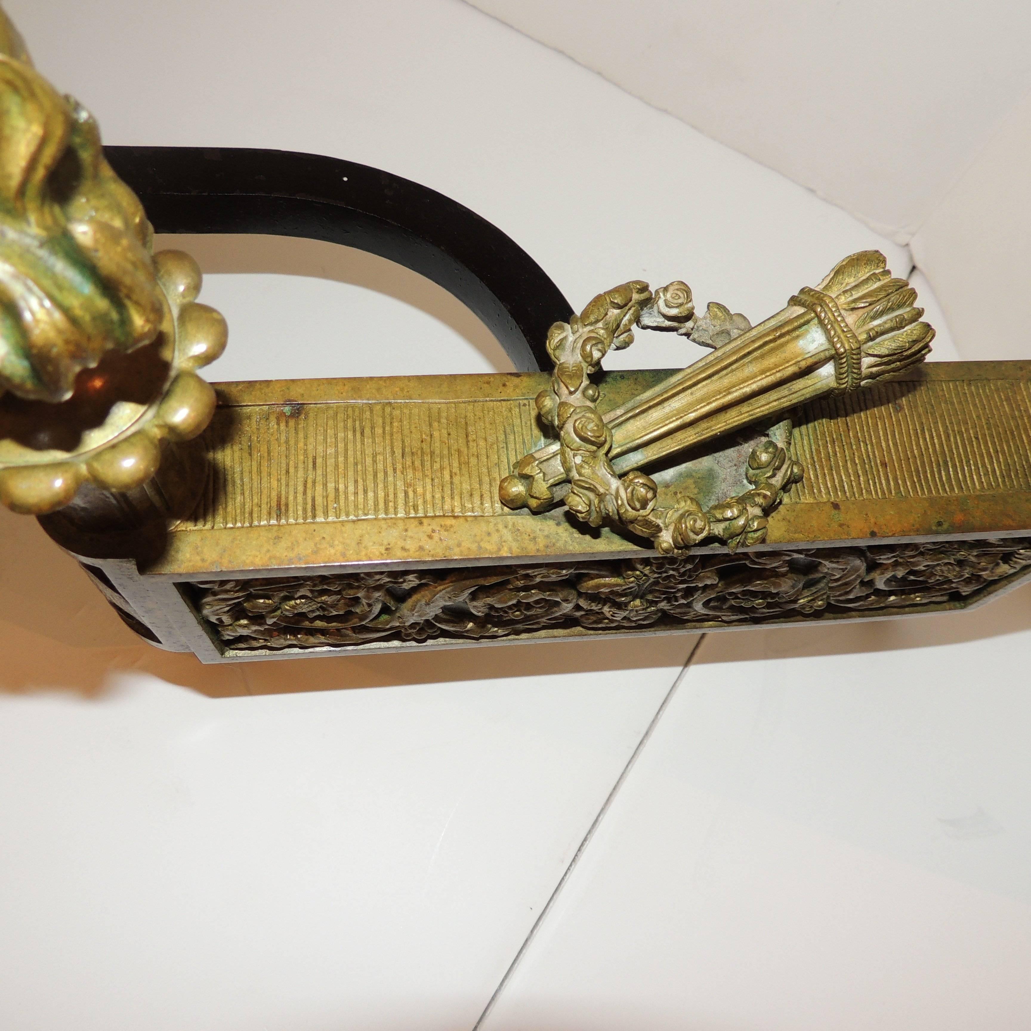 Wonderful French Neoclassical Gilt Dore Bronze with Black Marble Insert Chenets For Sale 4