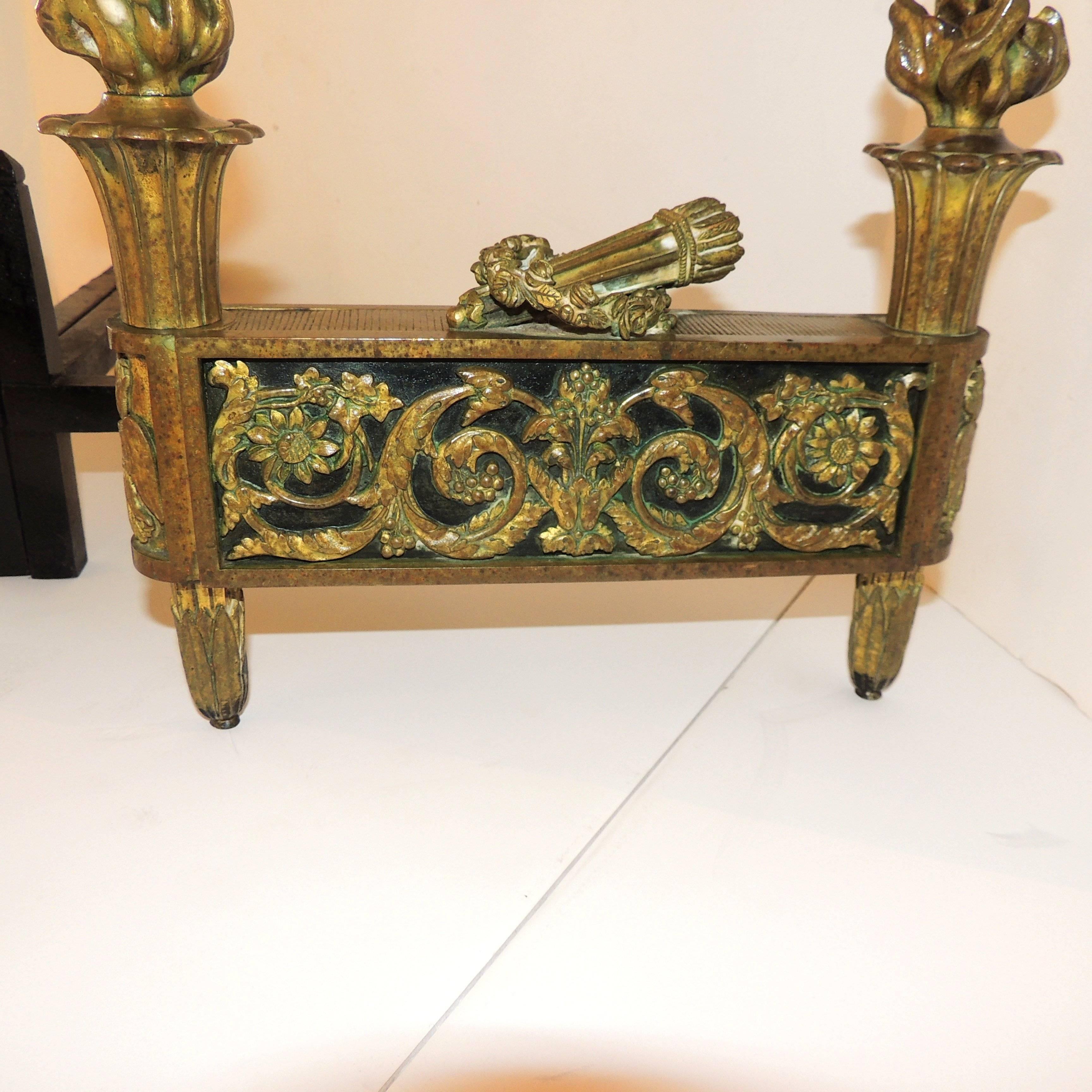Early 20th Century Wonderful French Neoclassical Gilt Dore Bronze with Black Marble Insert Chenets For Sale