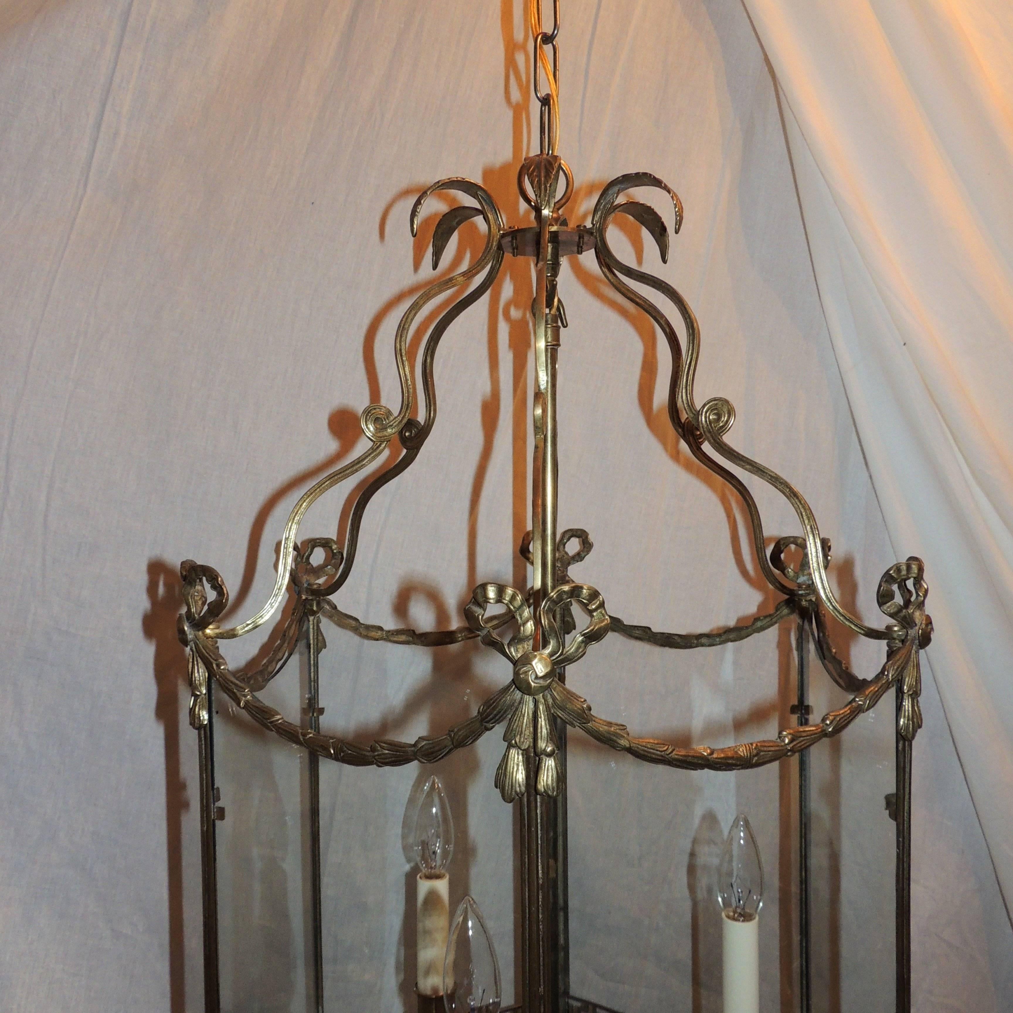 Wonderful Large Bronze Three-Light Bow Tassle Hexagon Lantern Pendent Fixture In Good Condition In Roslyn, NY