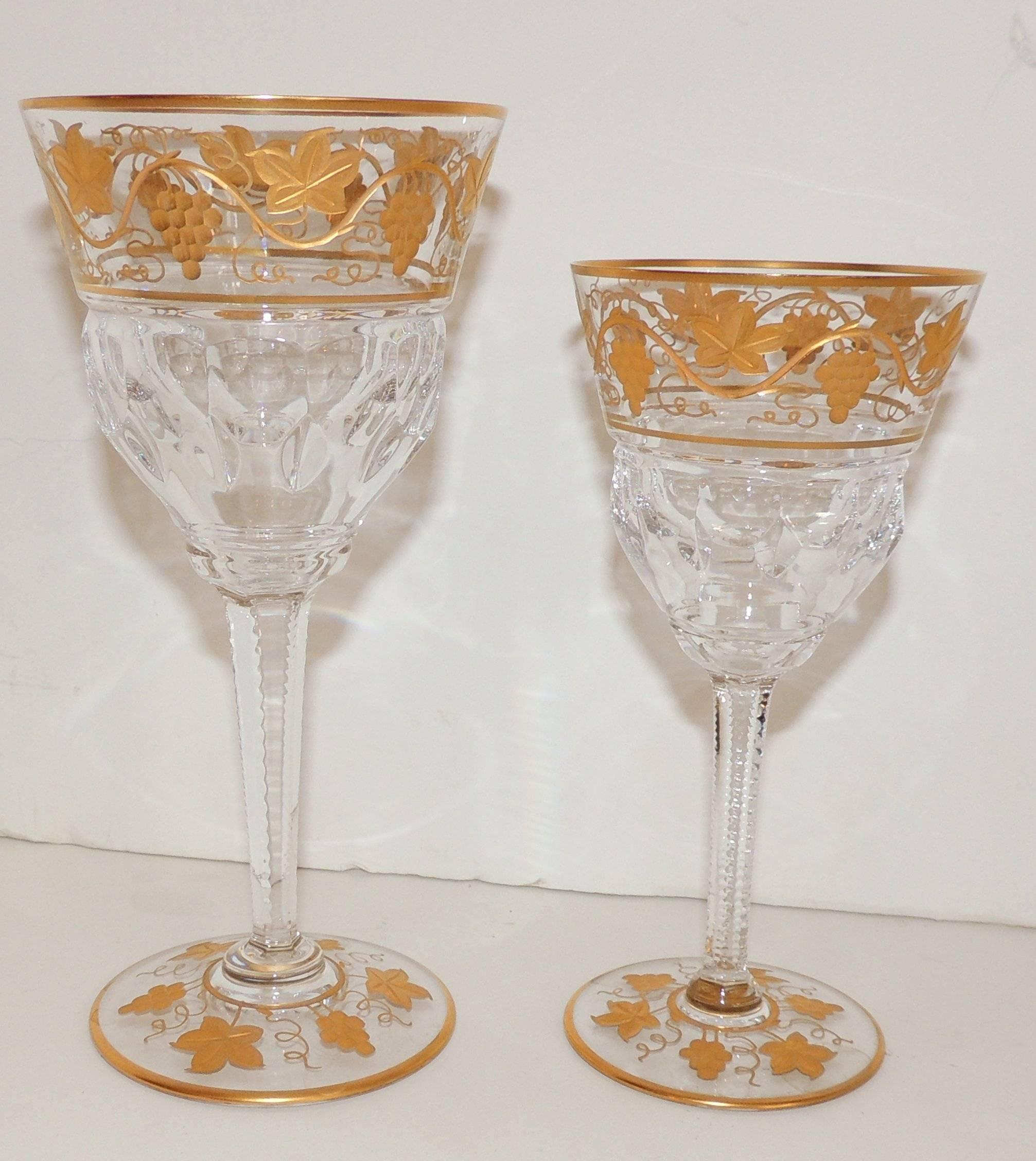 Wonderful set of goblets, stemware by Val St. Lambert Pampre D'Or pattern, circa 1930s. Gilt vine design water and wine glasses from Belgium.

Measures: 11 Wine 6.38