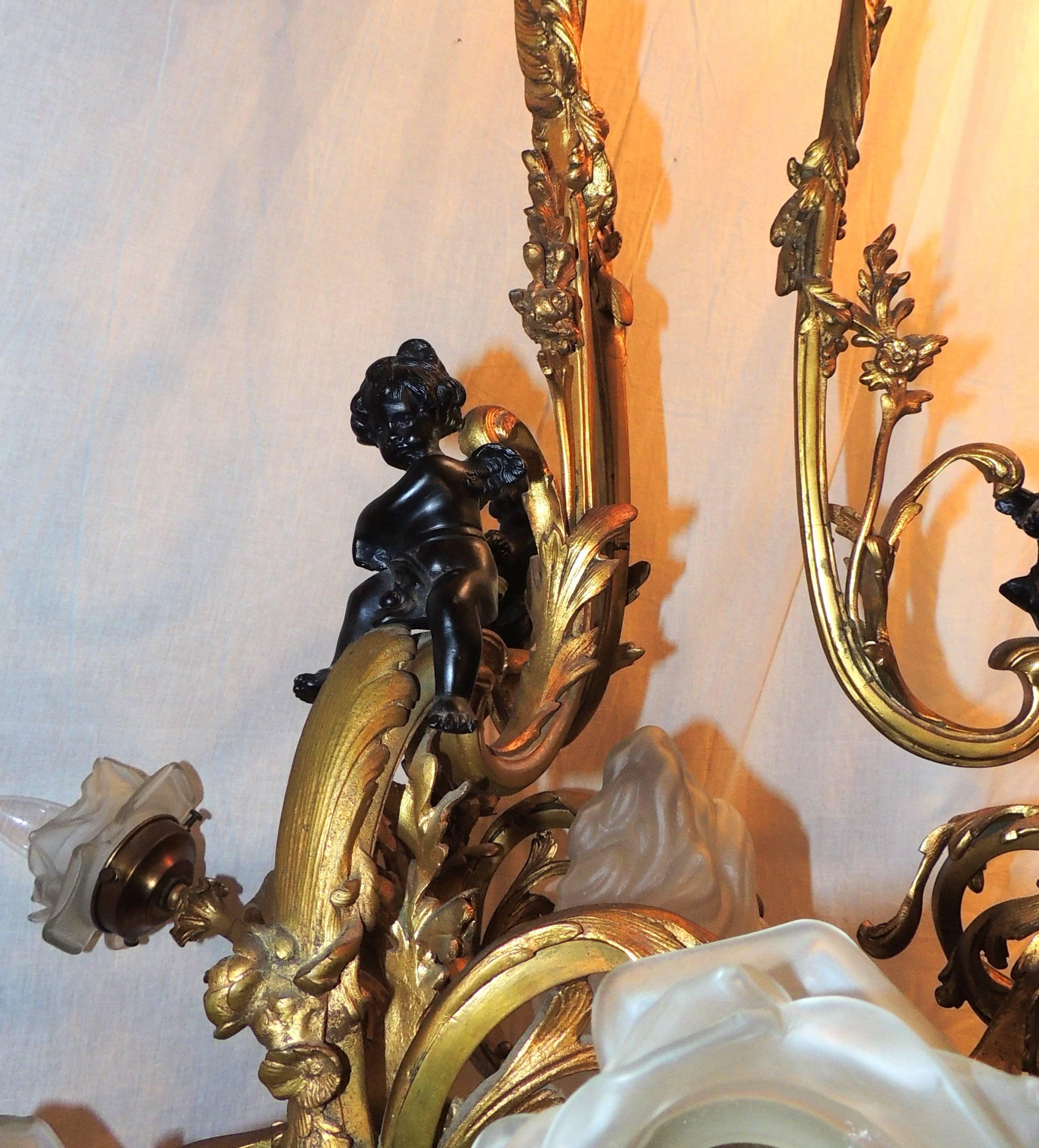 Wonderful 19th Century French Doré Bronze Cherub Rose Bud Shade Large Chandelier In Good Condition In Roslyn, NY