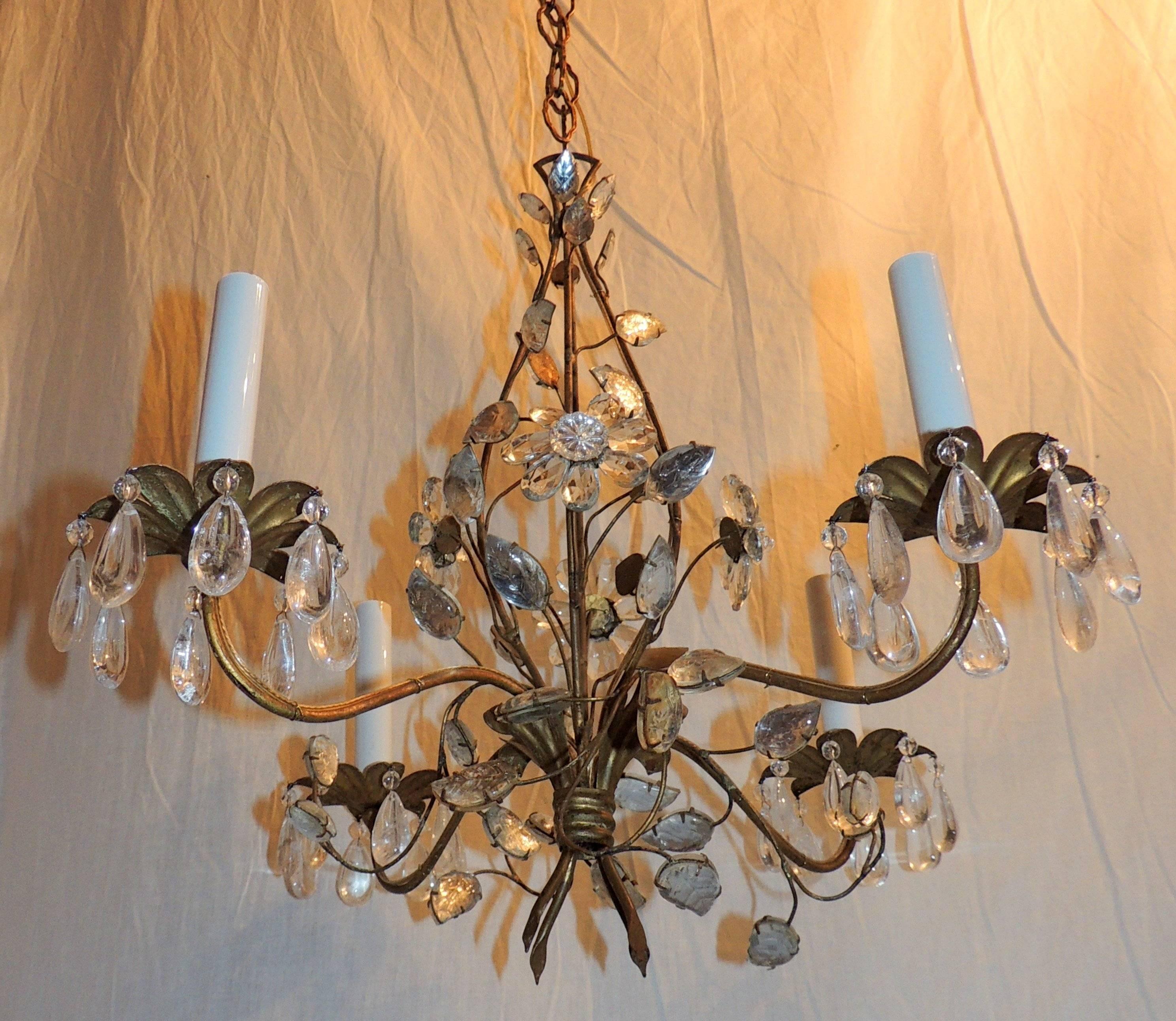 Wonderful Bagues six-light rock floral crystal gilt bronze transitional chandelier with delicate leaves and flowers entwined throughout.

Measures: 16" W x 22" H.