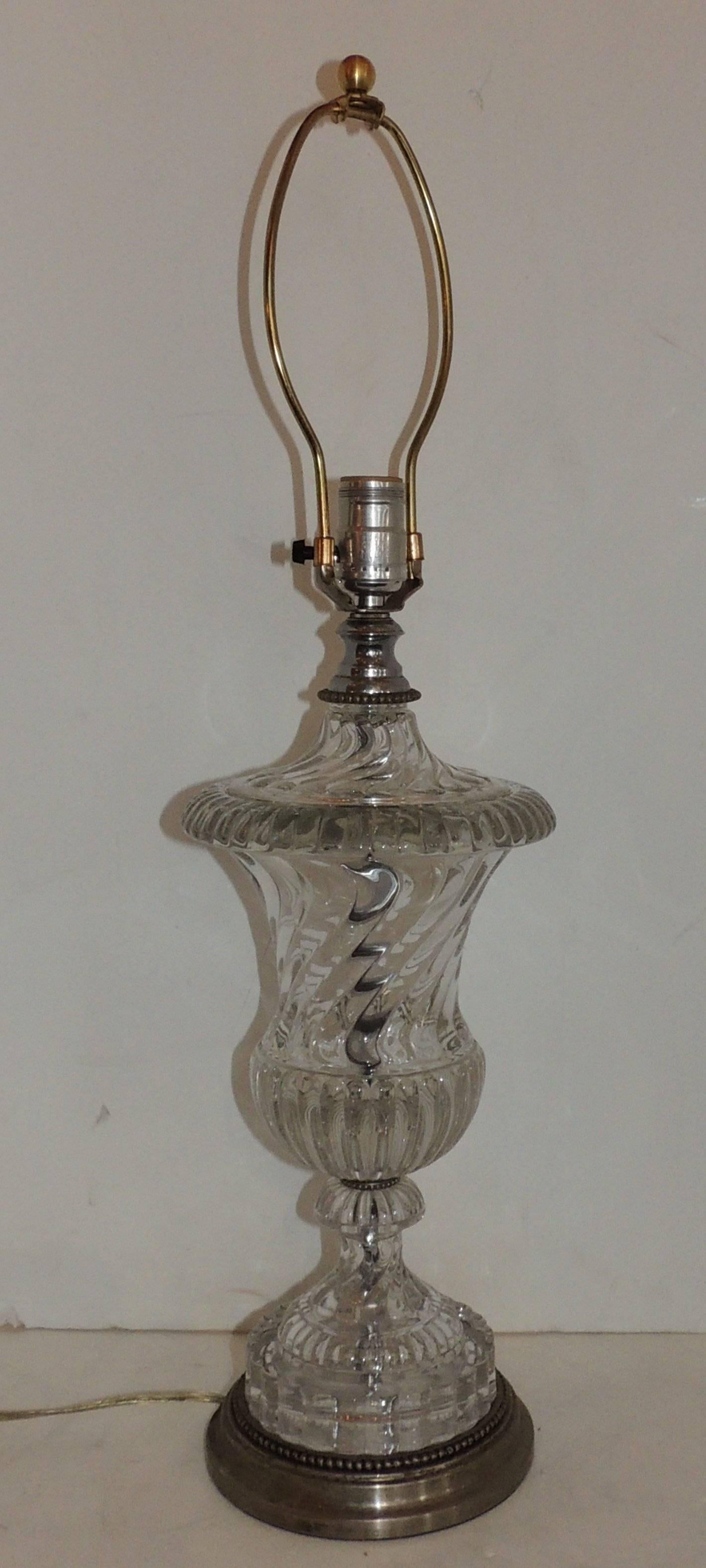 Wonderful pair of silver bronze Baccarat style swirl glass urn form crystal lamps
Measures: 27" H x 8" W

Urn 16" H.