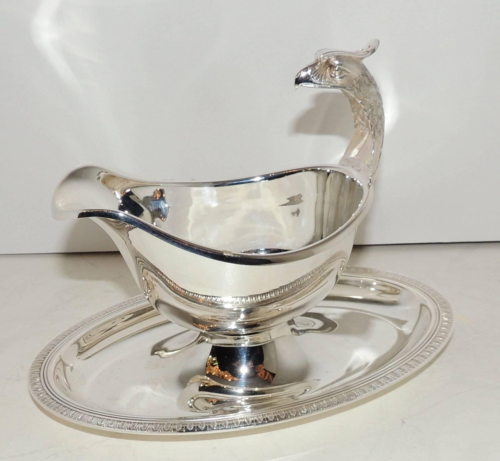  Wonderful Christofle Malmaison  Pedestal Silver Plate Gravy Server. The pattern Malmaison Is In the Regency Empire style, with it's frieze of delicate palm and lotus leaves and symmetrical design Finished With Swan Handel Centerpiece.

Measures