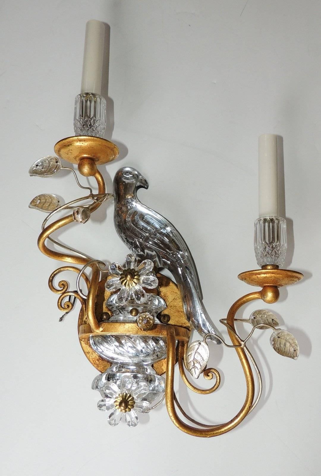 This endearing set of Bagues style vintage gilt and glass/crystal sconces are beautifully balanced with leaves and the crystal urn the bird is sitting on. Fluted crystal bobeches set off the crystal candle cup with rock crystal drops sitting next to