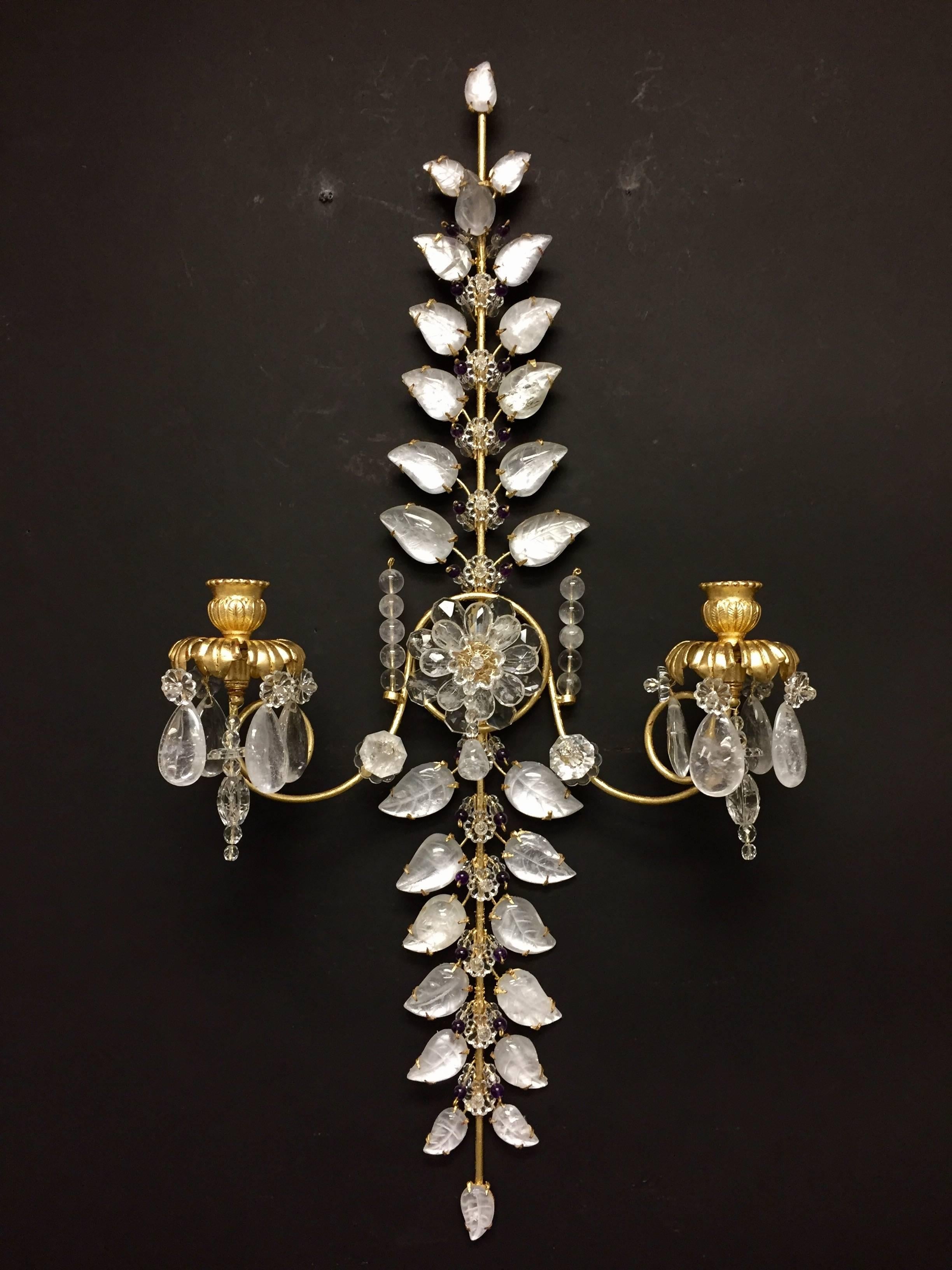 Wonderful pair of gilt two-arm sconces with rock crystal leaves, rock crystal pendants on the bobeches and amethyst crystal beads.
Wiring is available for additional $350
Measures: 28