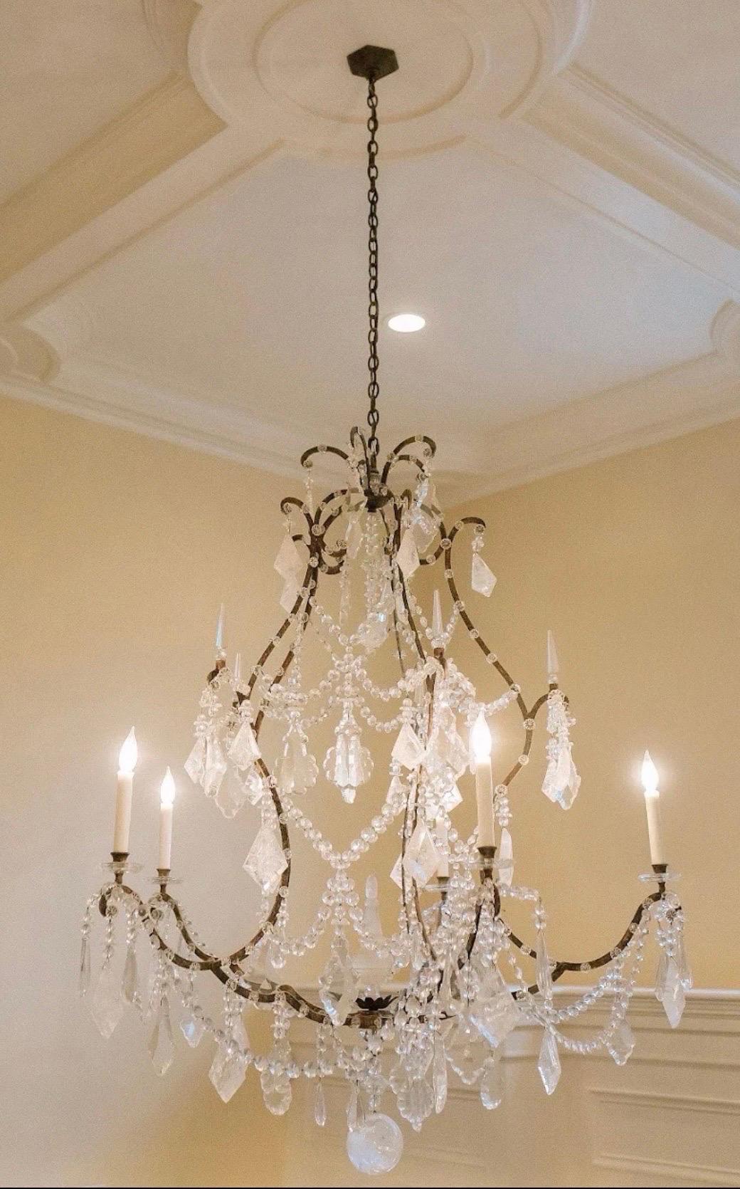 A wonderful silver & gold gilt wash and alternating rock crystal & crystal drop very large 5 candelabra light chandelier dressed with crystal bobeches and swags as well as flower rosettes along the arms and centered by a large rock crystal obelisk n