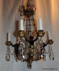 Pair of French Dore Bronze and Crystal Patinated Cherubs Chandeliers