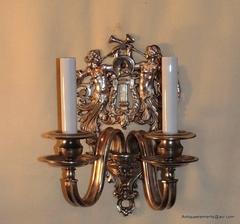 Wonderful Pair of Two-Light Silvered Bronze Figural Trumpets Caldwell Sconces