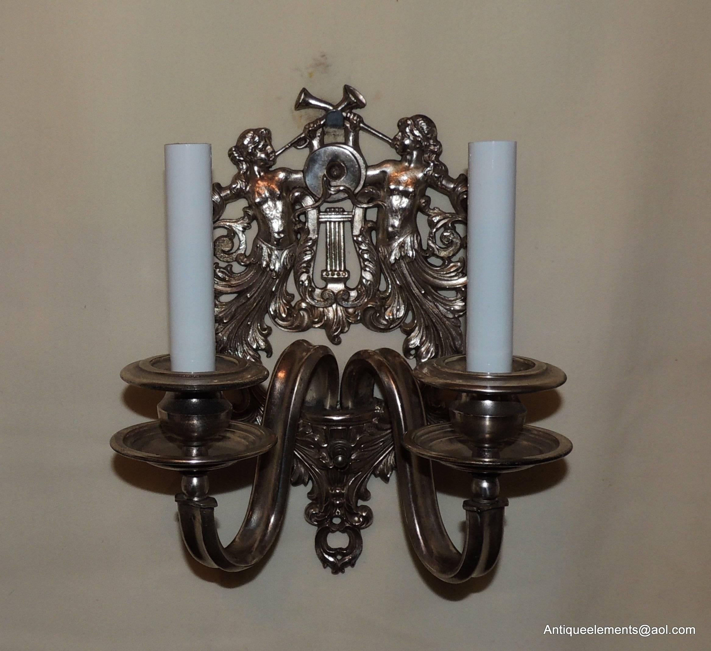 French Wonderful Pair of Two-Light Silvered Bronze Figural Trumpets Caldwell Sconces For Sale