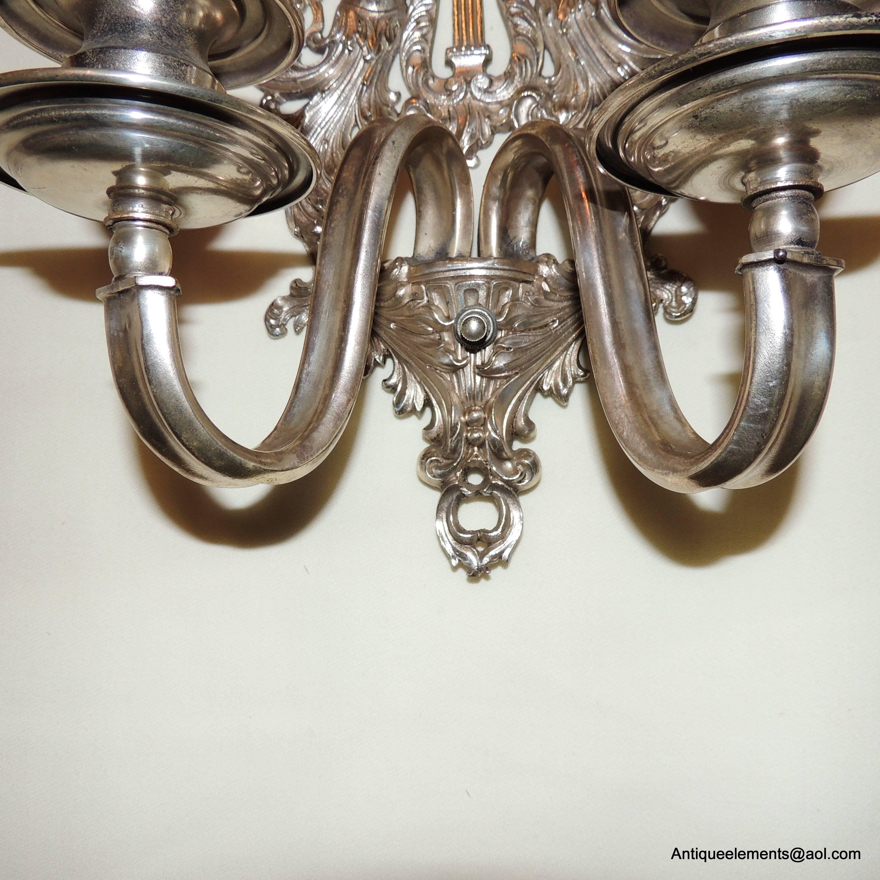 Wonderful Pair of Two-Light Silvered Bronze Figural Trumpets Caldwell Sconces For Sale 1