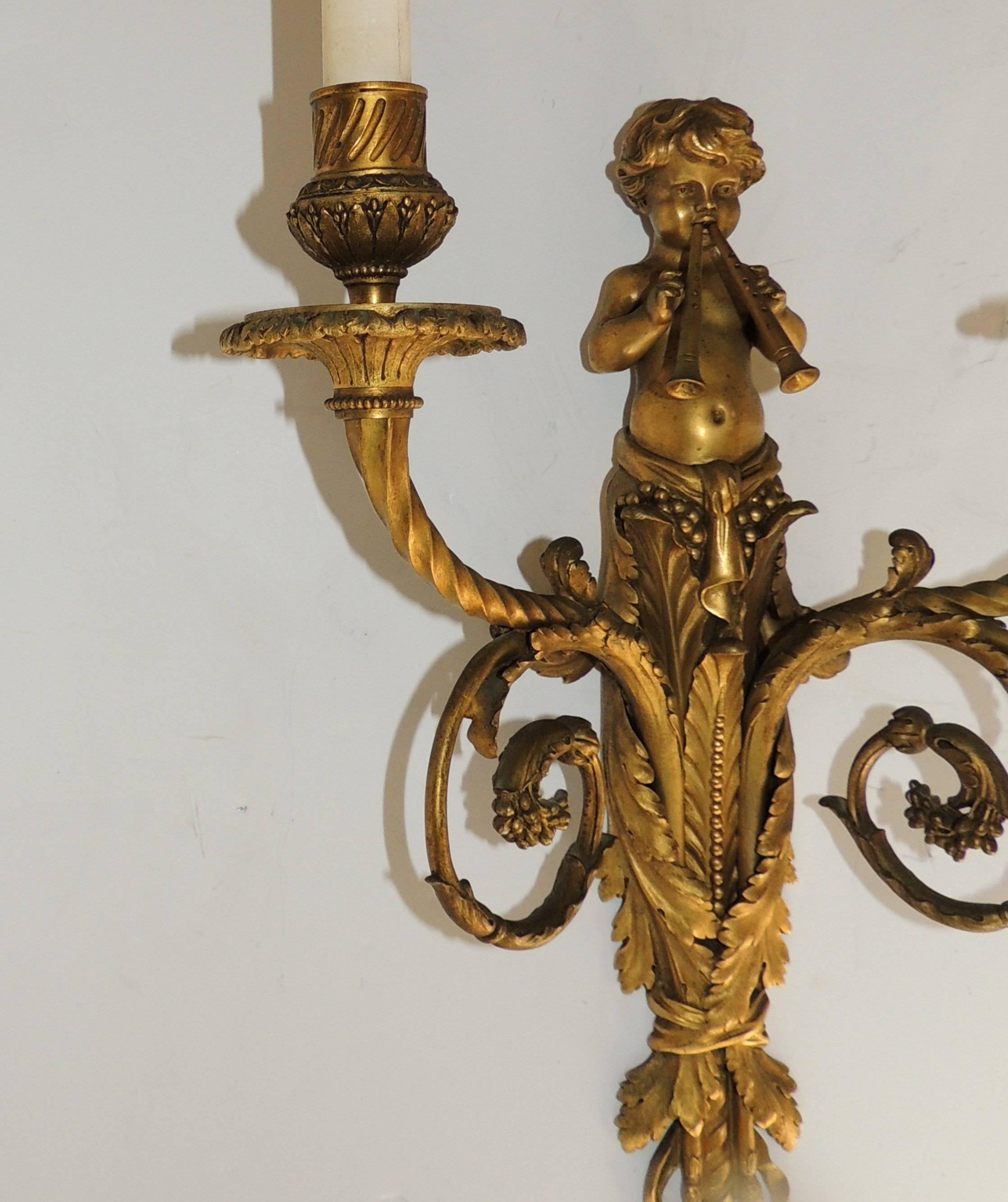 Exquisite Pair Of Antique French Dore Bronze Cherub Putti Flute Two Arm Sconces In Good Condition In Roslyn, NY