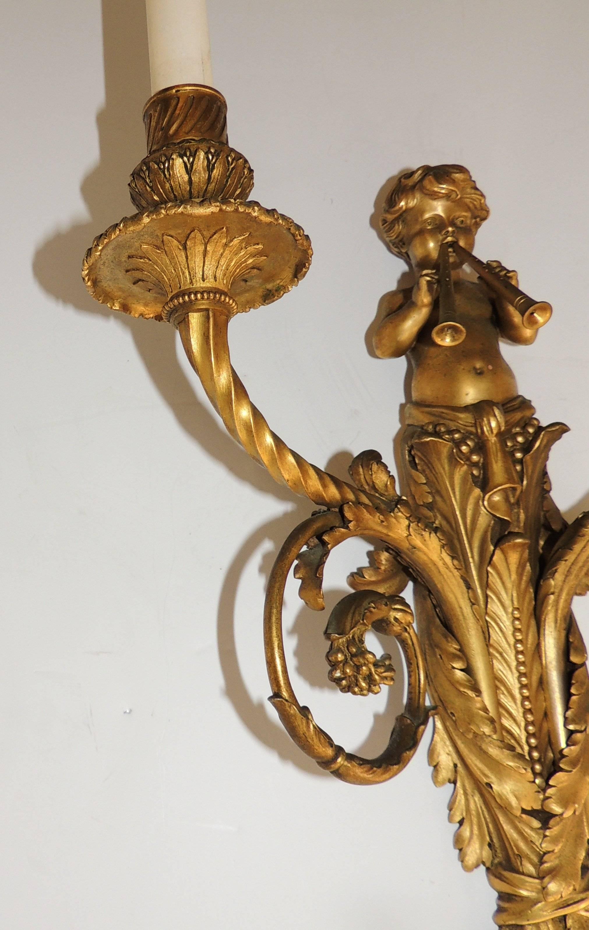 Late 19th Century Exquisite Pair Of Antique French Dore Bronze Cherub Putti Flute Two Arm Sconces