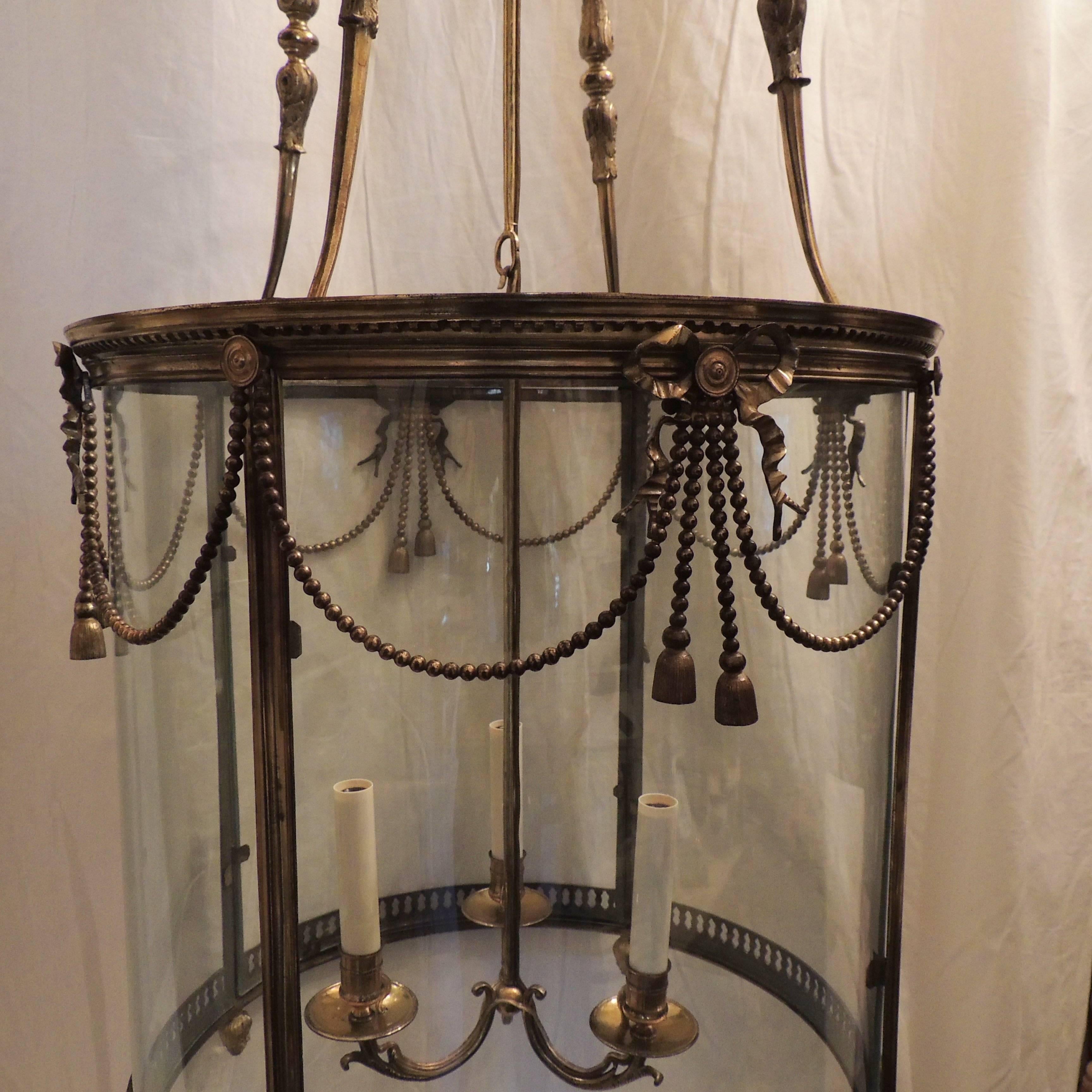 Early 20th Century Palatial Large French Louis XVI Gilt Bronze Ribbon & Bow Swag Lantern Chandelier