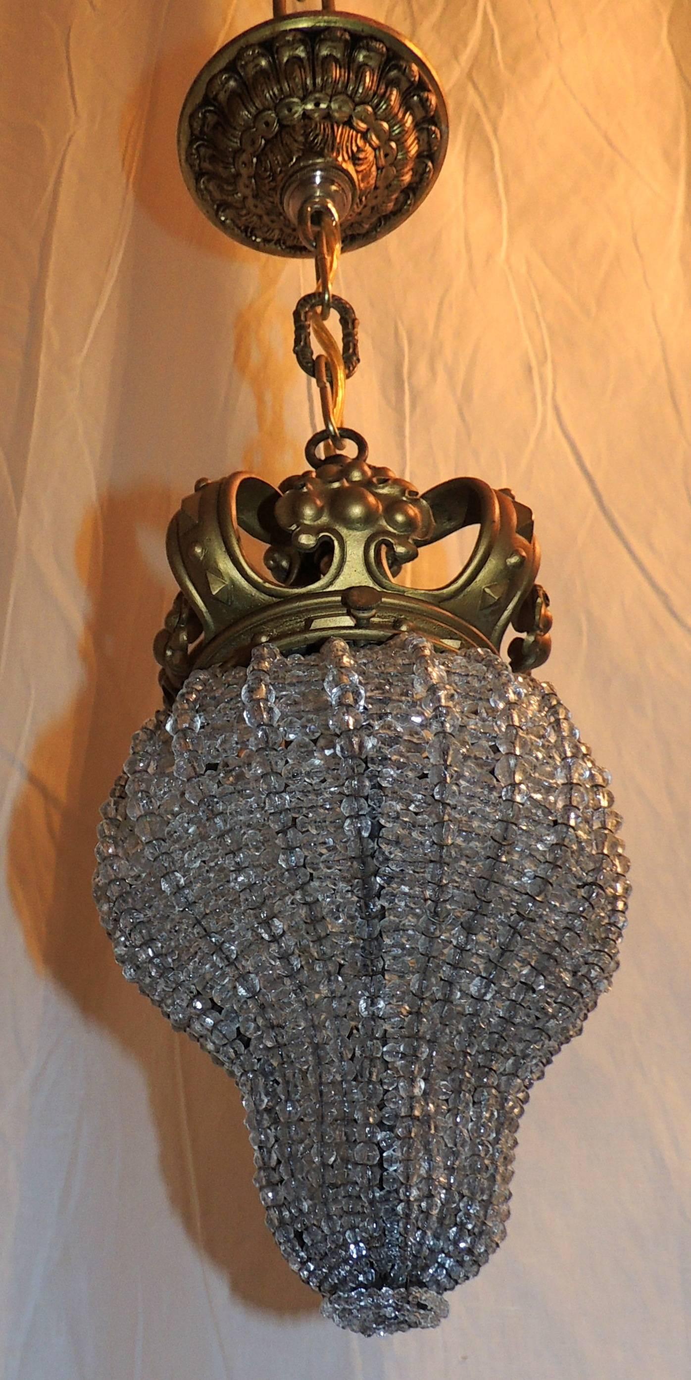 Wonderful French bronze crown and beaded light fixture chandelier.