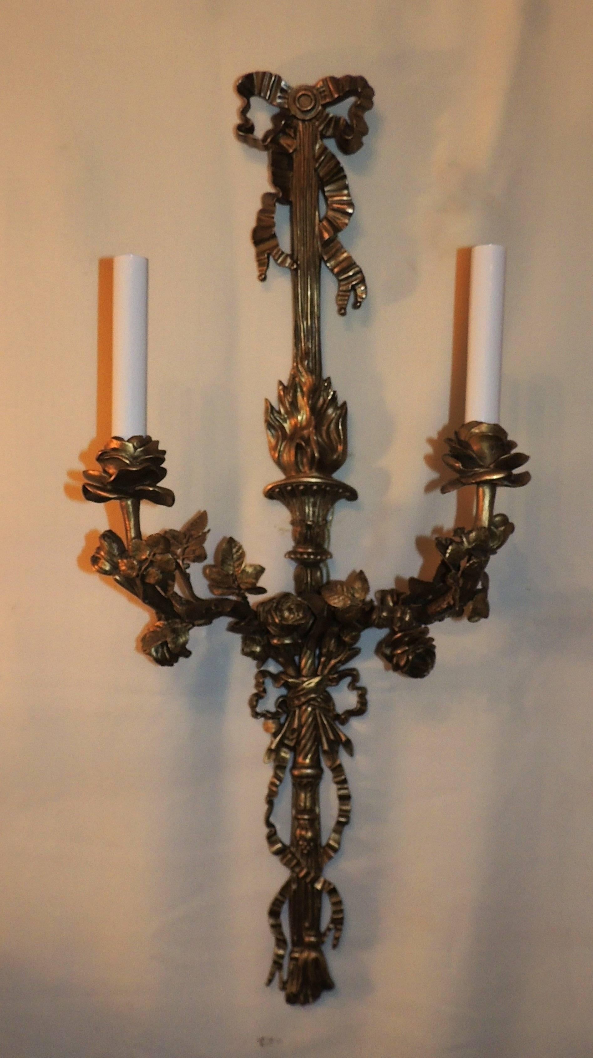 Wonderful French pair of gilt bronze two-arm bow top ribbon sconces with roses.
Two pair available.