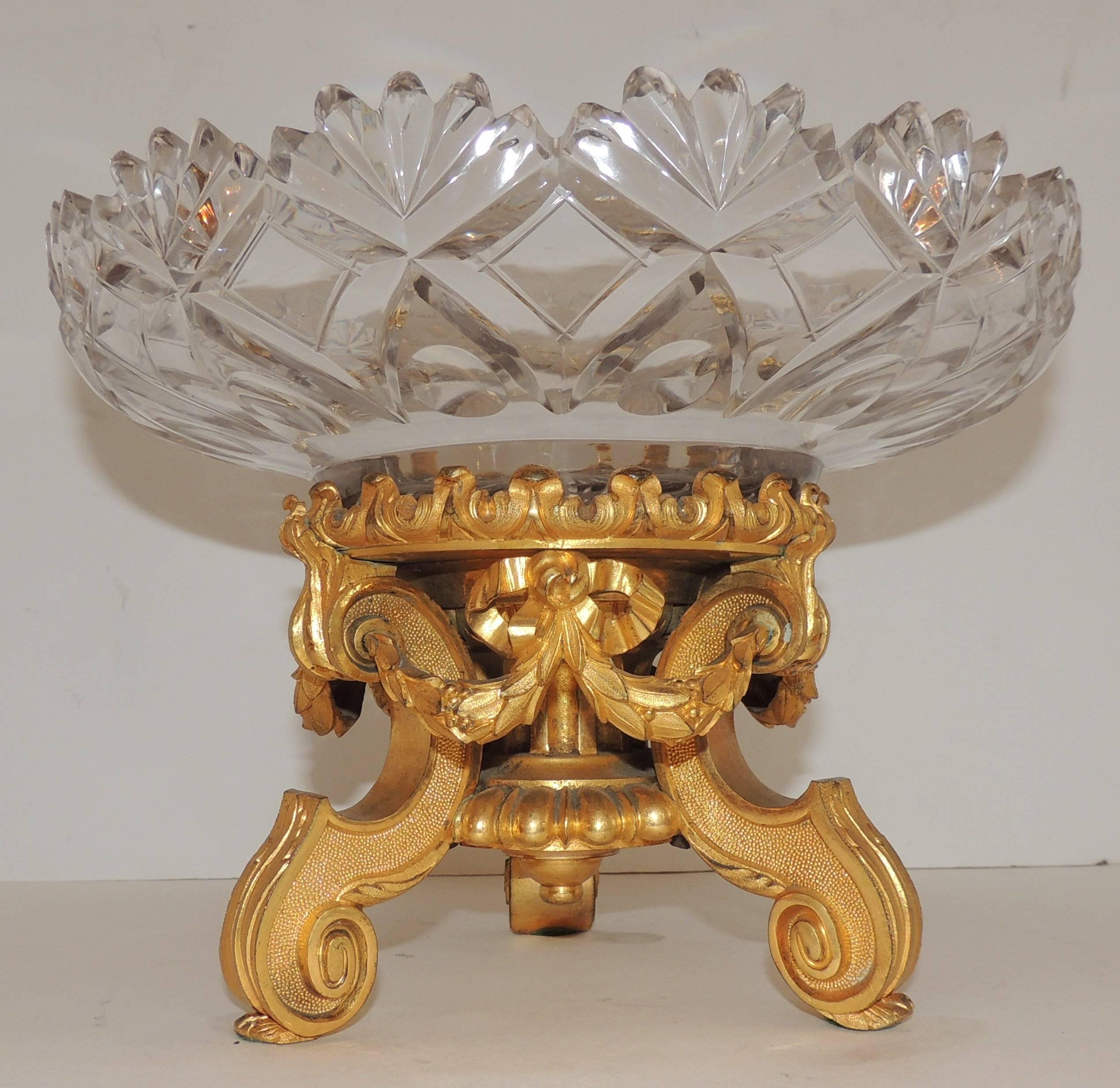 Wonderful French Dore bronze and cut crystal round centerpiece gilt bows and swags finish off the base of this incredible cut crystal bowl.