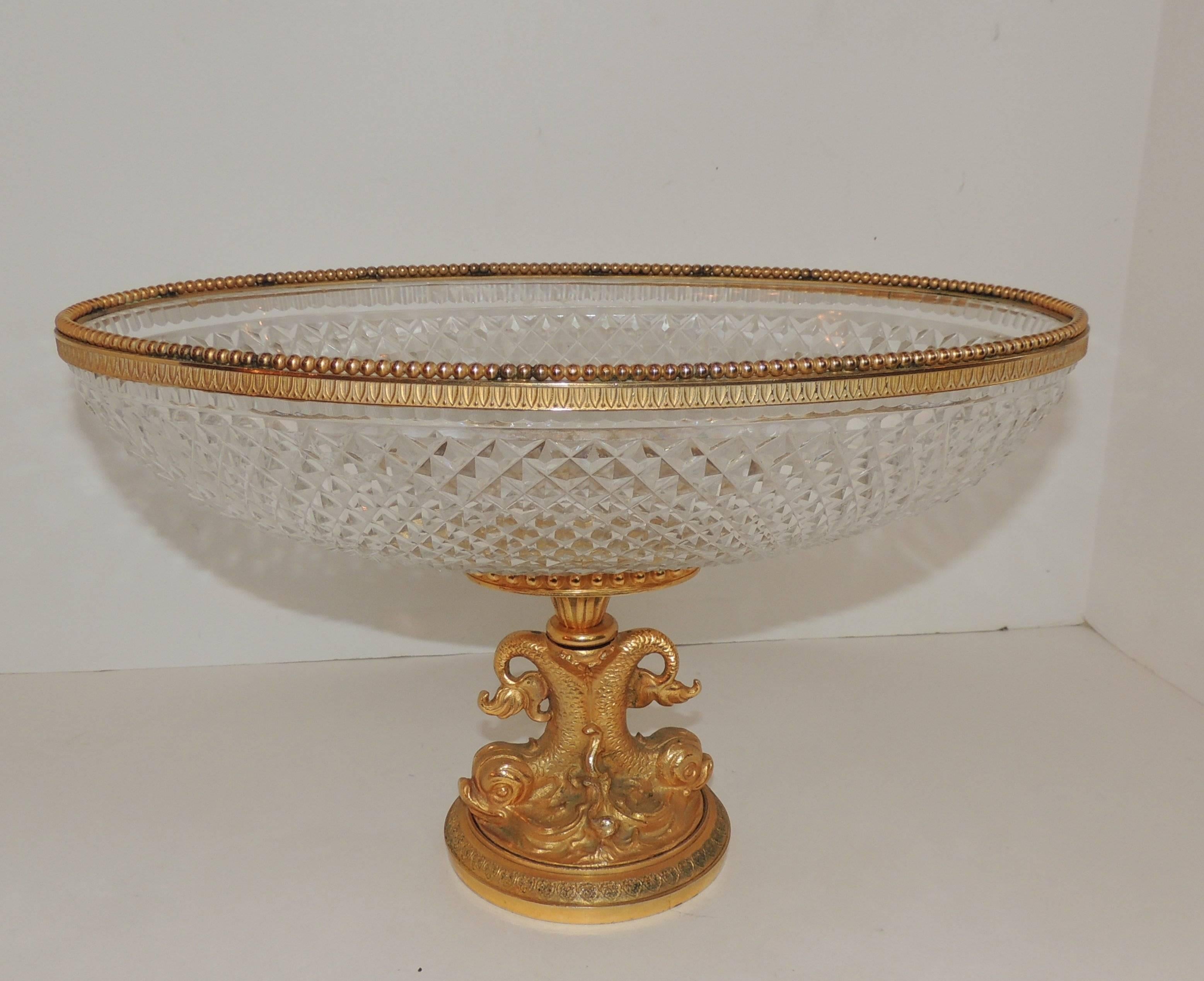 Wonderful French cut crystal and doré gilt bronze very fine dolphin motif oval centerpiece finished off with a beaded bronze rim on top.