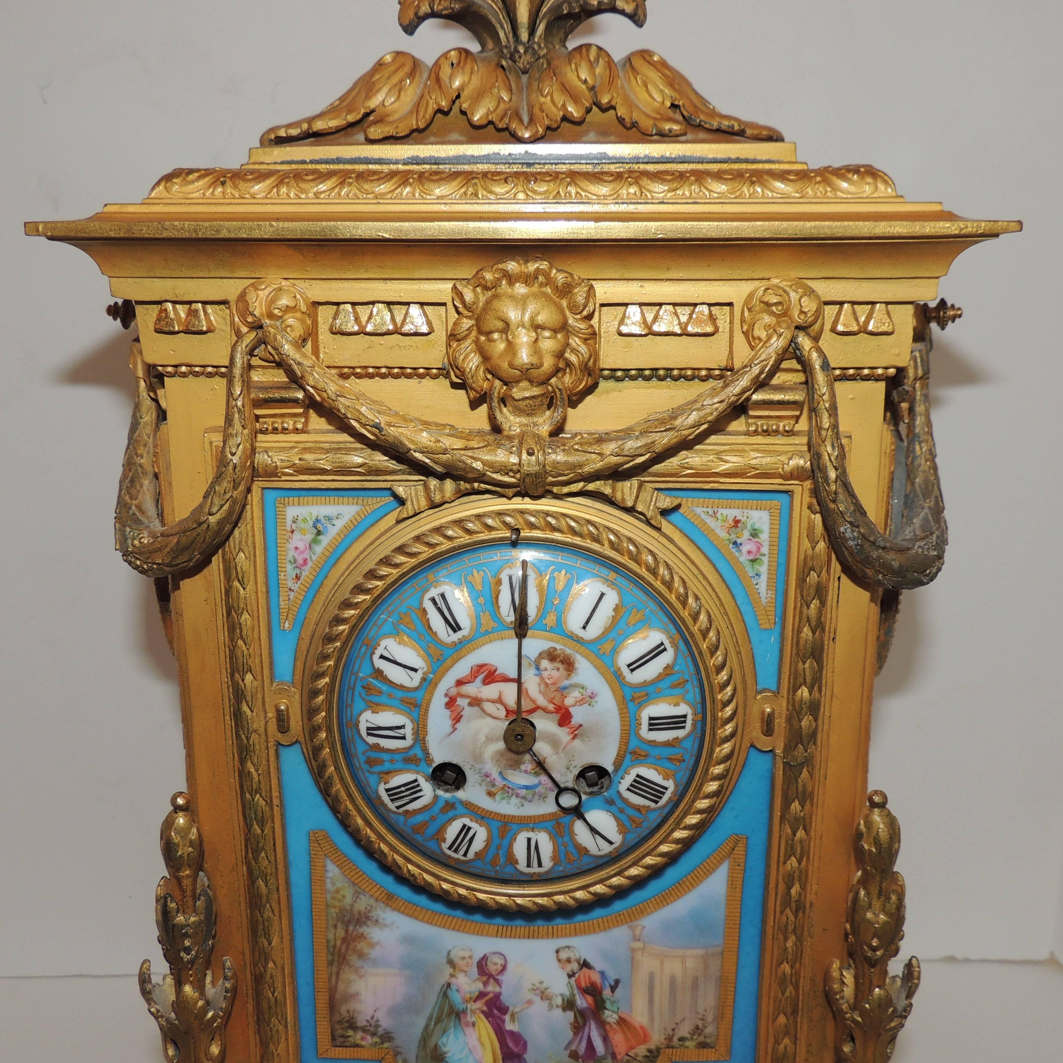 Wonderful French Enameled Cherub Doré Bronze Porcelain Clock Swag Lion Mask In Good Condition For Sale In Roslyn, NY