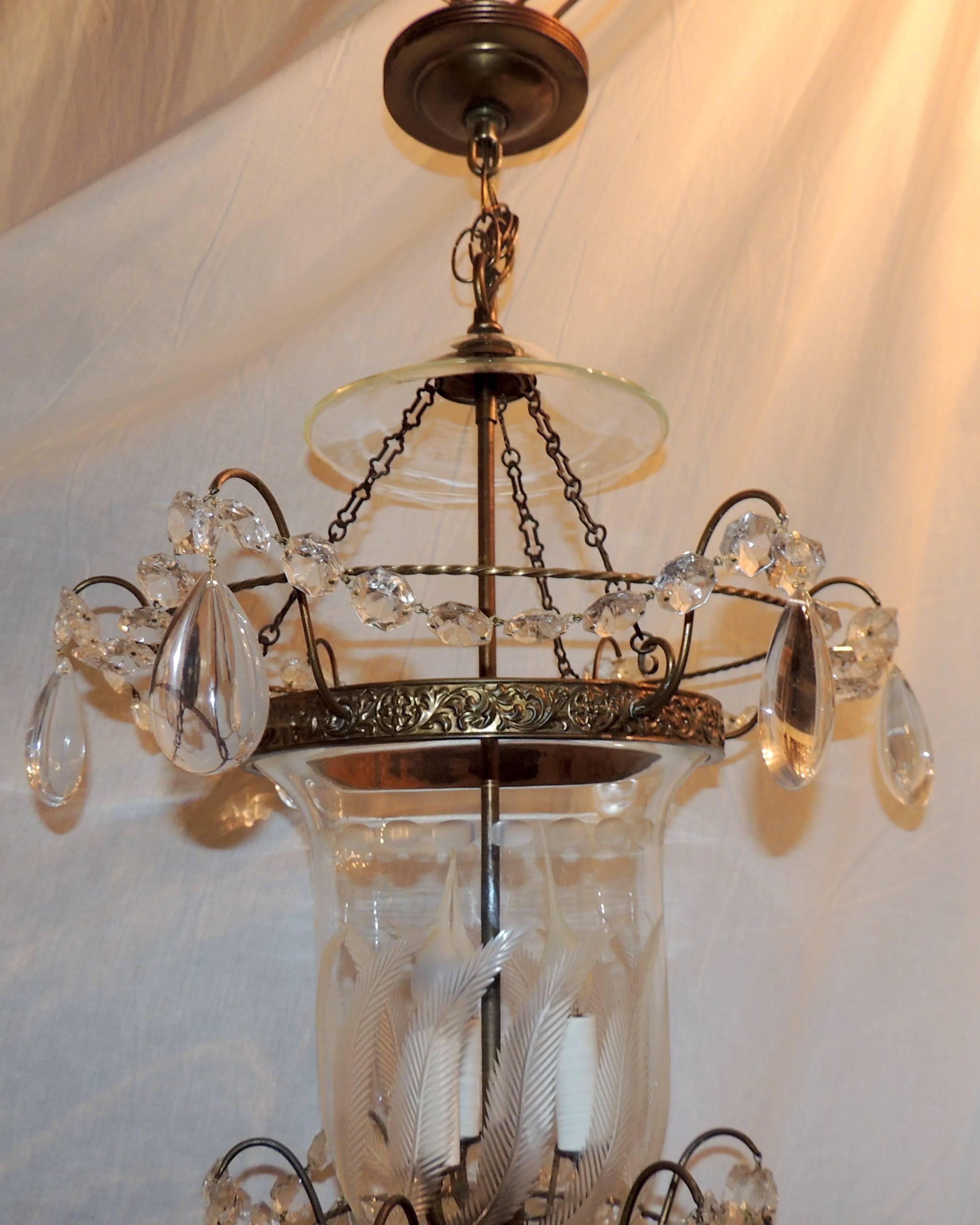 A wonderful etched glass leaf design bronze-mounted with crystals and swags in the Regency, neoclassical motif bell jar lantern fixture with three lights inside.
Completely rewired and ready to install.
 
Measures: 18" W x 26" H.

