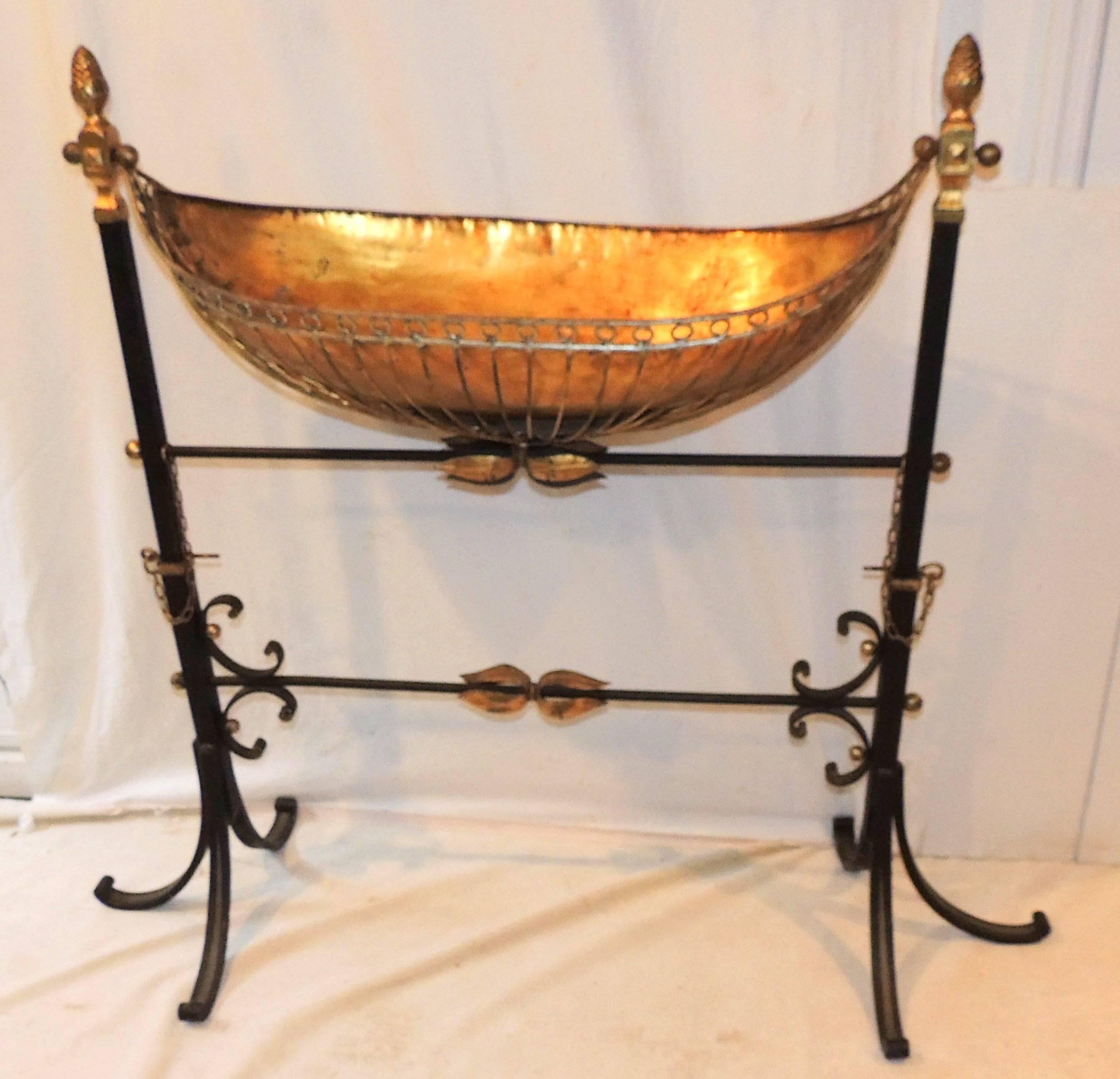 Wonderful French wrought iron copper gilt tole bird bath planter swing stand.
The planter is 14