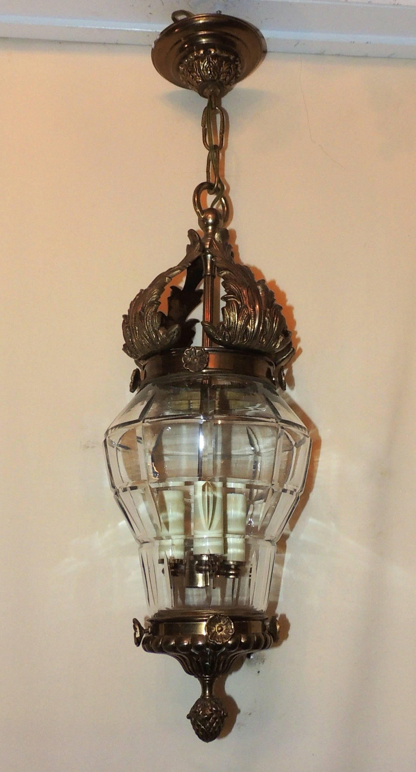 Wonderful French bronze filigree beveled panel glass lantern chandelier fixture with three lights.

Measures: 20" H x 10" W.
