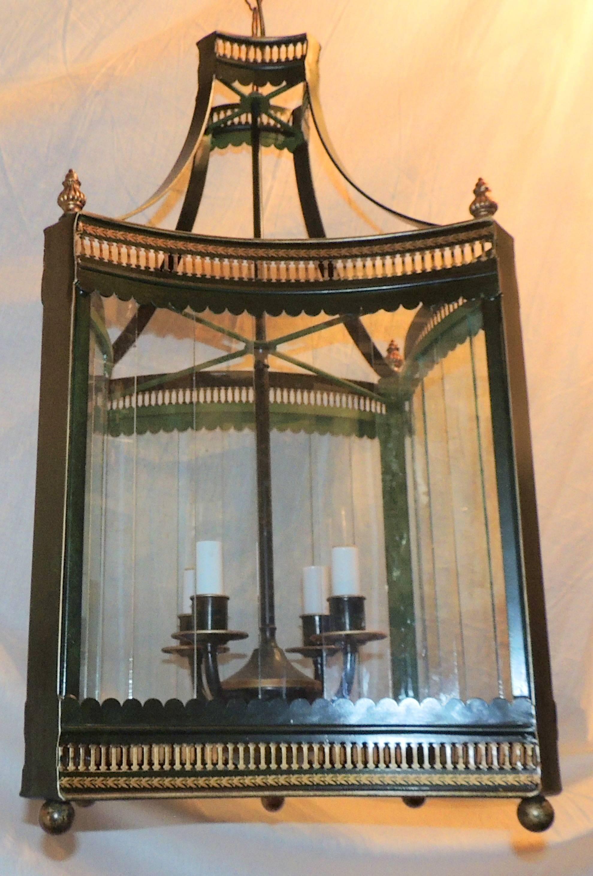 A handsome vintage four-light green tole and hand-painted gilt lantern with curved panel glass. Rewired and ready to install.

Measures: 30