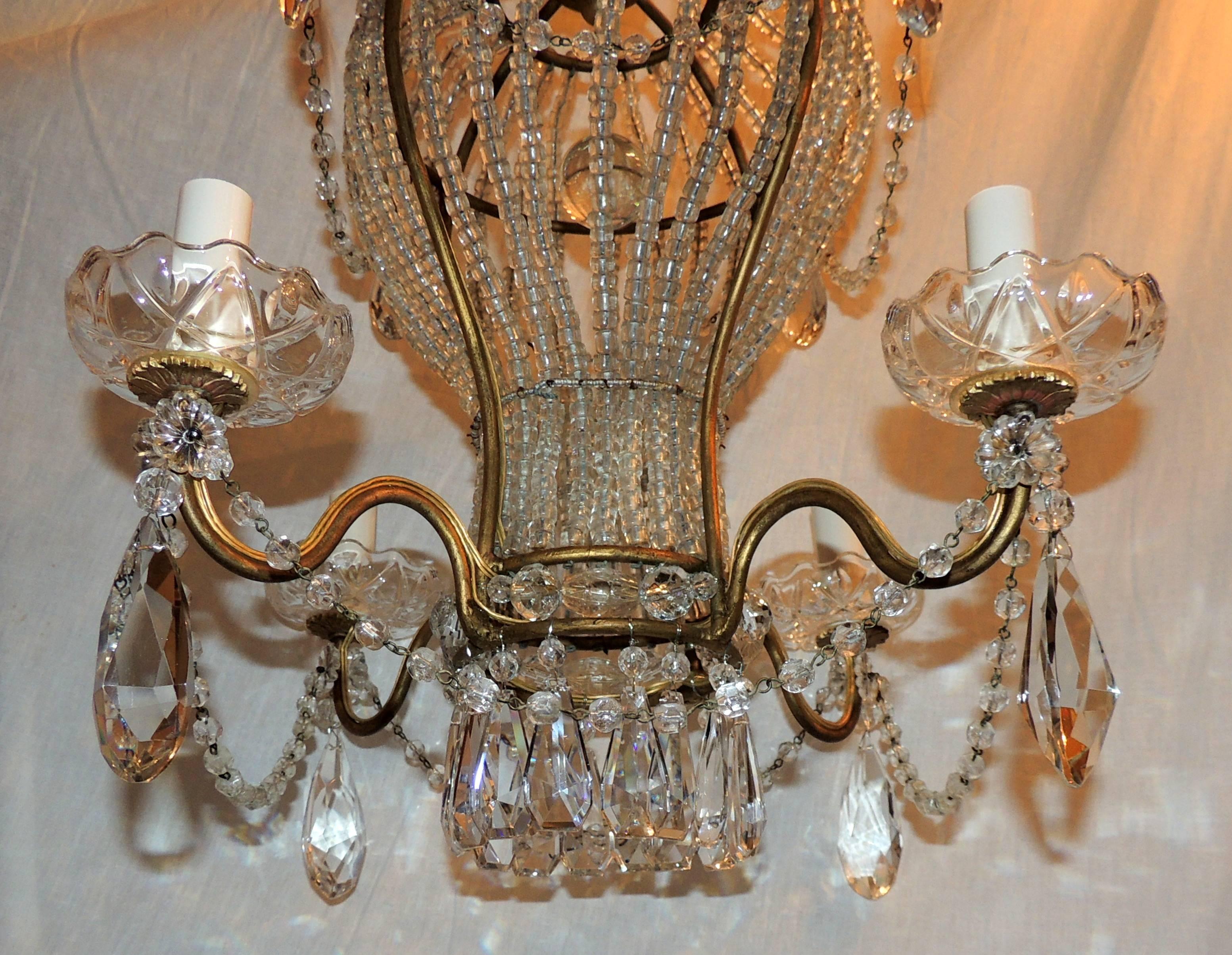 A wonderful vintage Italian gilt and beaded crystal hot air balloon chandelier light fixture with beaded crystal swags and adorned with cut crystal drops throughout. Completely redone and comes ready to install.

Actual fixture measures:
18