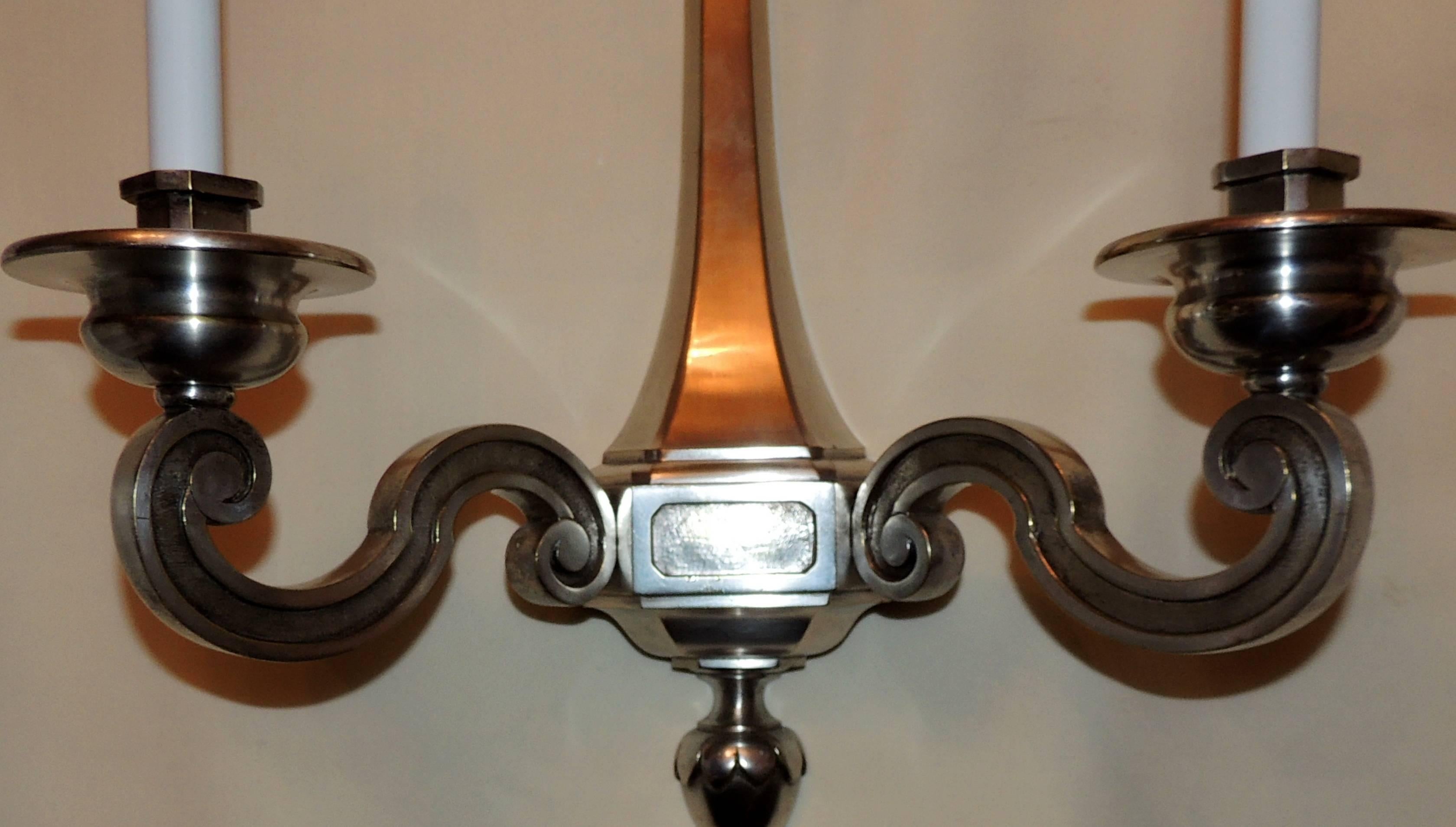 A handsome pair of large silvered bronze in the manner of E.F. Caldwell regency neoclassical two light wall sconces.
completely redone and ready to enjoy

Measures: 17 1/2