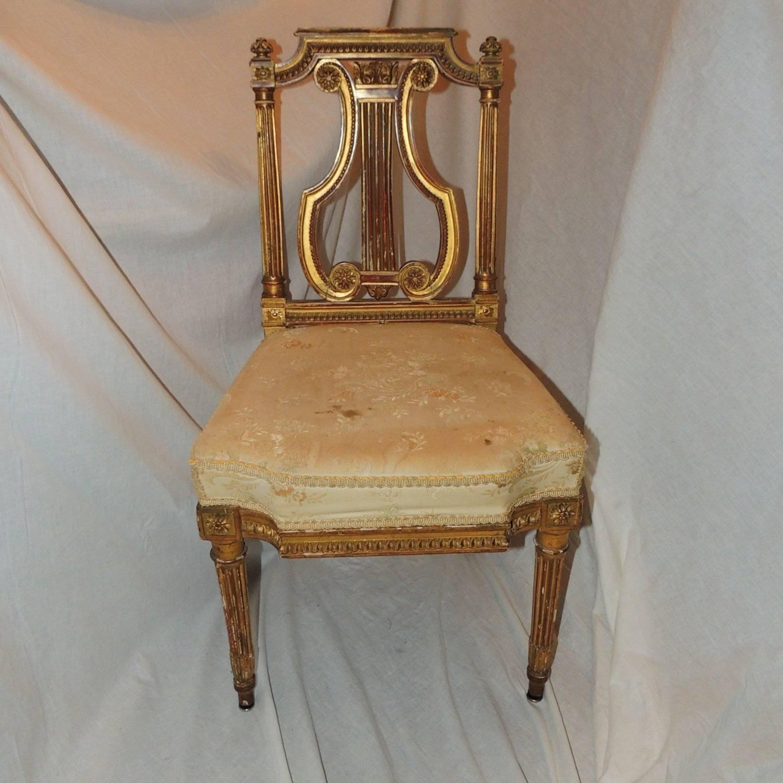 Wonderful set of FIVE (5) French gold gilt carved harp lyre back regency neoclassical dining or living room ladies side chairs

Sold per chair

Measures: 18 wide x 33 high

Seat: 14.5 deep x 17 high