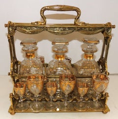 Wonderful French Bronze Bow Swag Crystal Tantalus Liquor Decanter Bar Ware Set