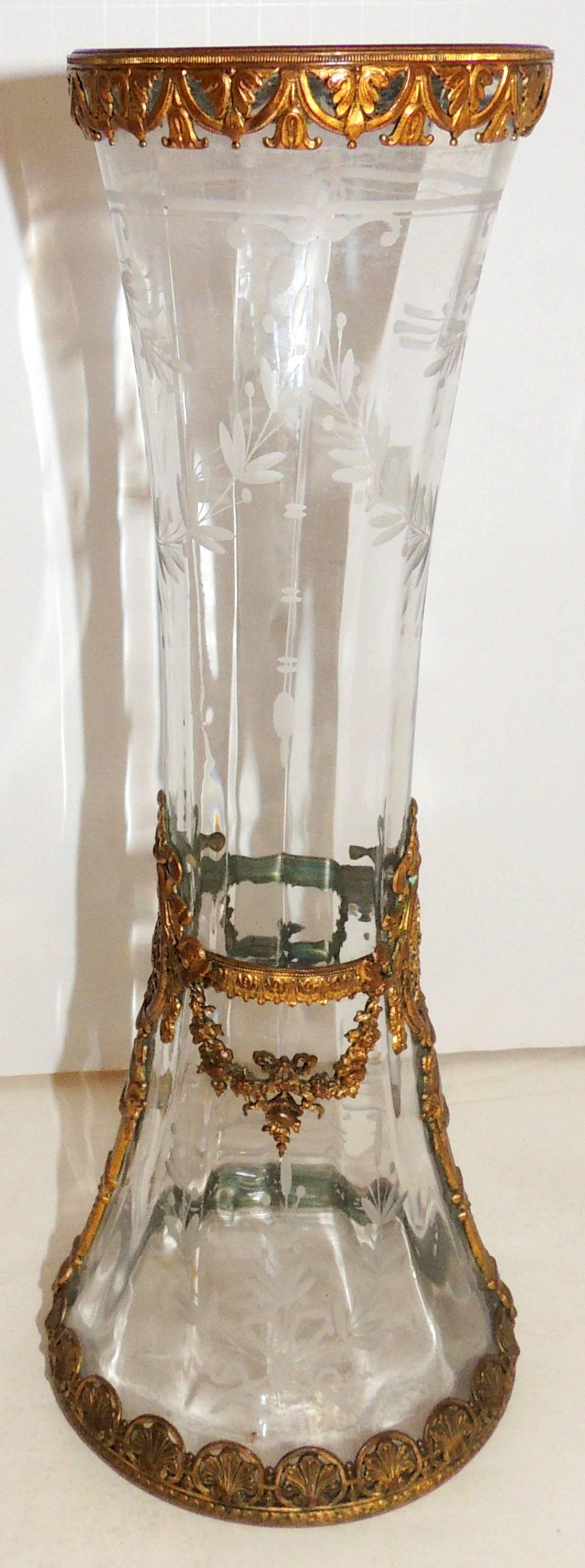 A wonderful French etched crystal with bows and garlands with gilt doré bronze ormolu vase.