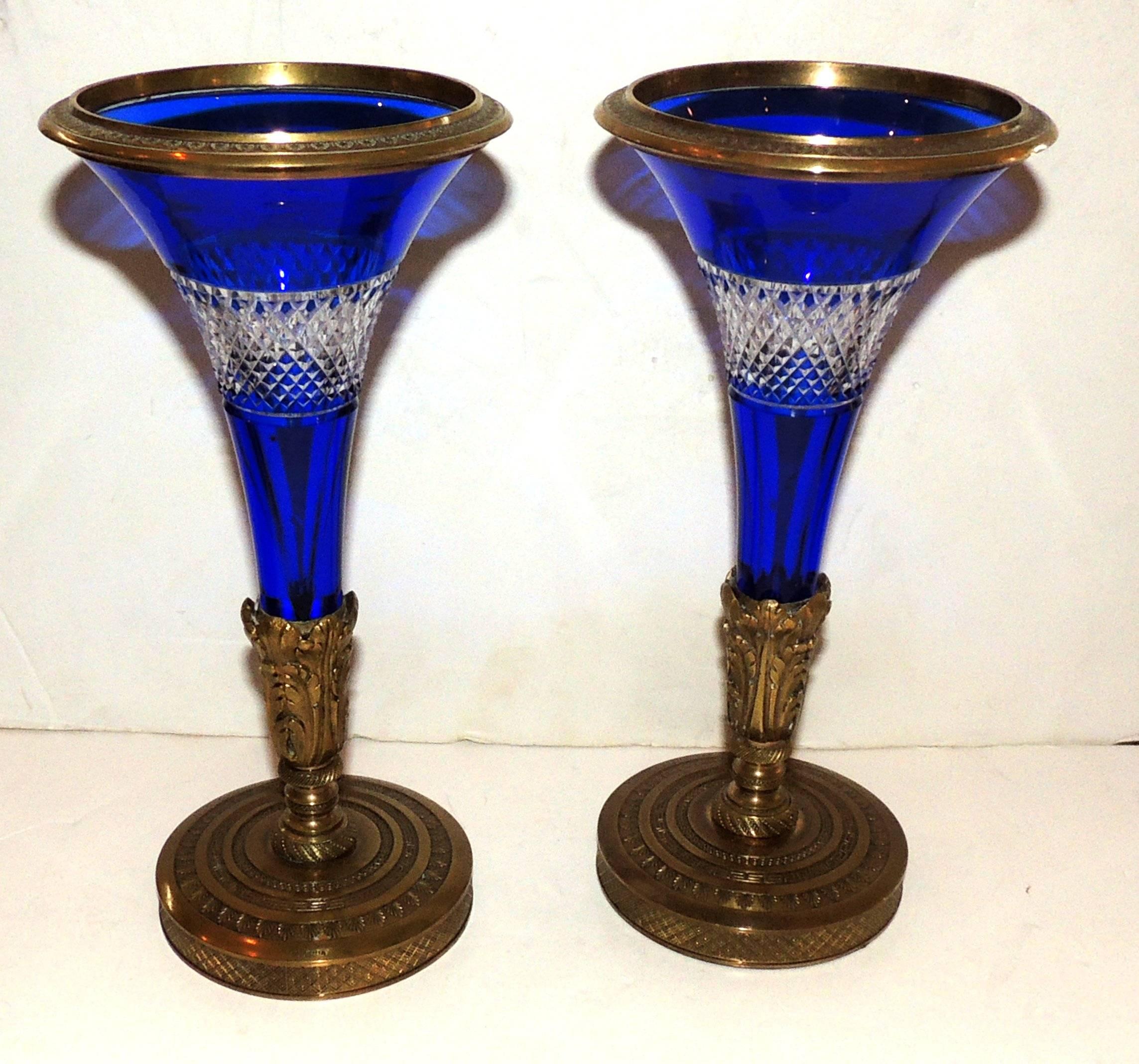 A wonderful pair of finely detailed Austrian doré bronze-mounted with cobalt cut crystal vases

Measures: 9.25