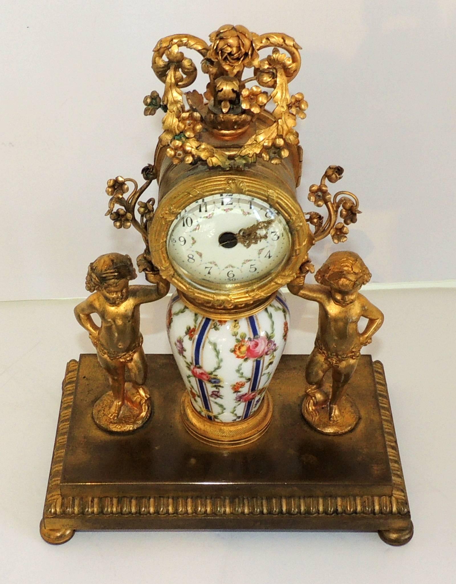 French Hand-Painted Porcelain Ormolu Dore Bronze-Mounted Cherub Putti Clock In Good Condition In Roslyn, NY