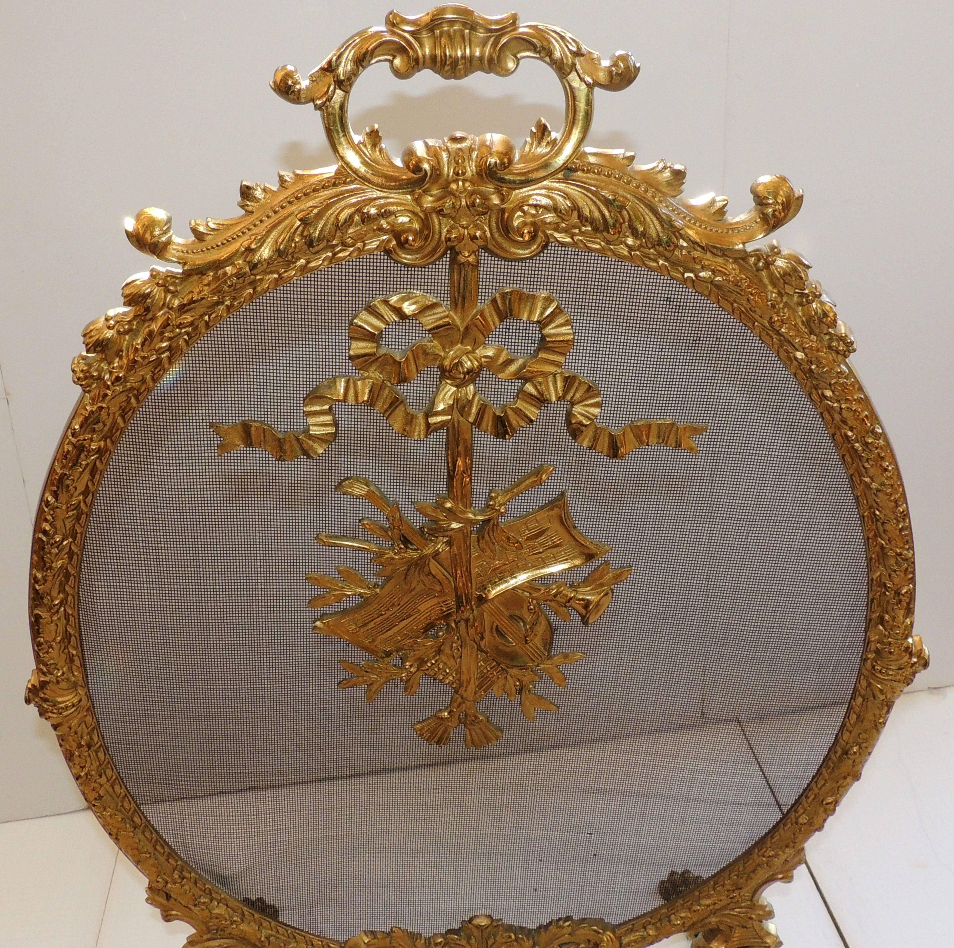 French Doré Bronze Oval Ormolu-Mounted Basket Bows Instruments Fireplace Screen In Good Condition In Roslyn, NY