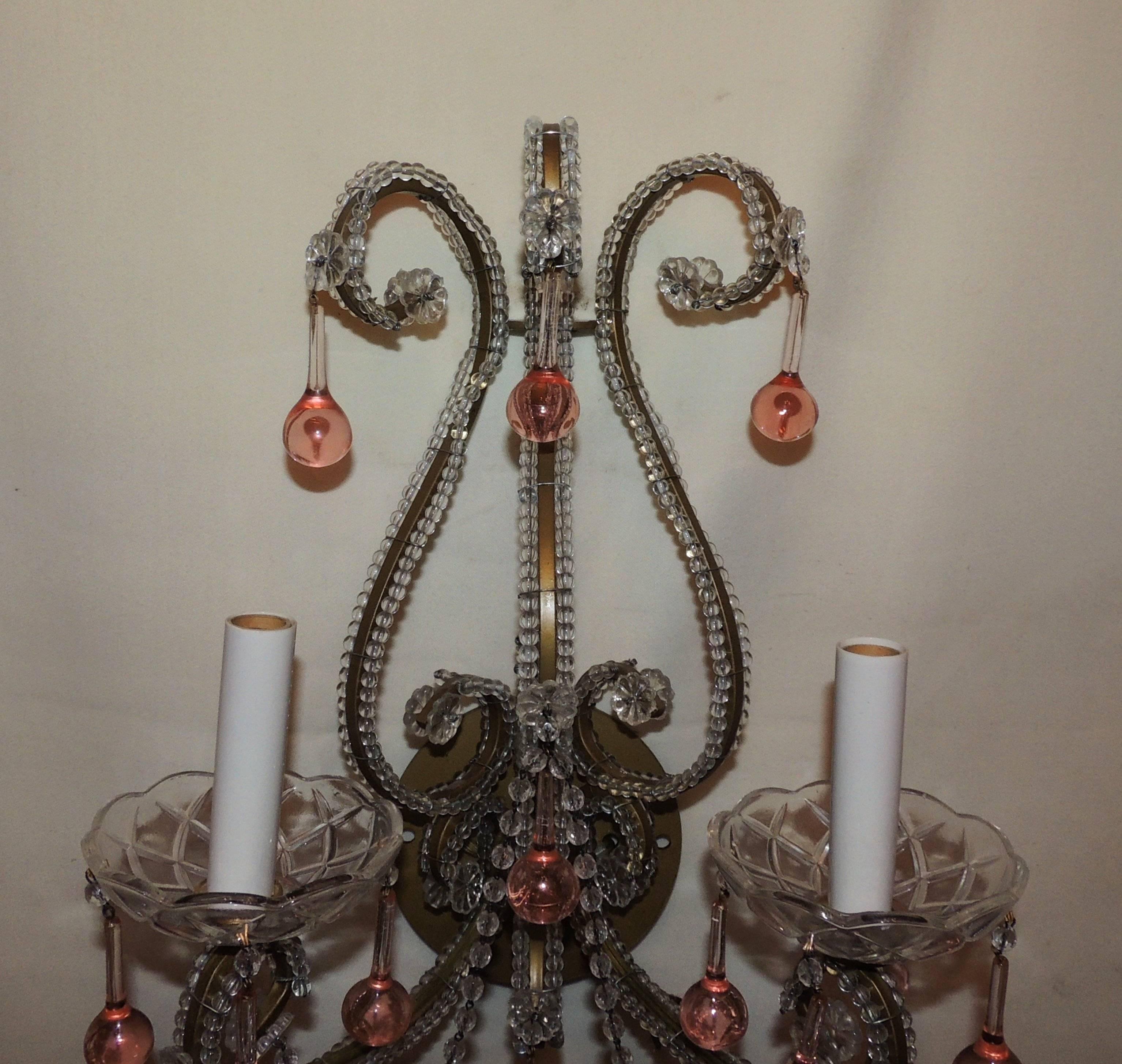 Wonderful pair of fine beaded Italian two light crystal sconces with peach colored crystal drops. Minor wear to gilding, some of the beads and crystals have been reattached but still retain the look of old. Completely rewired and ready to install in