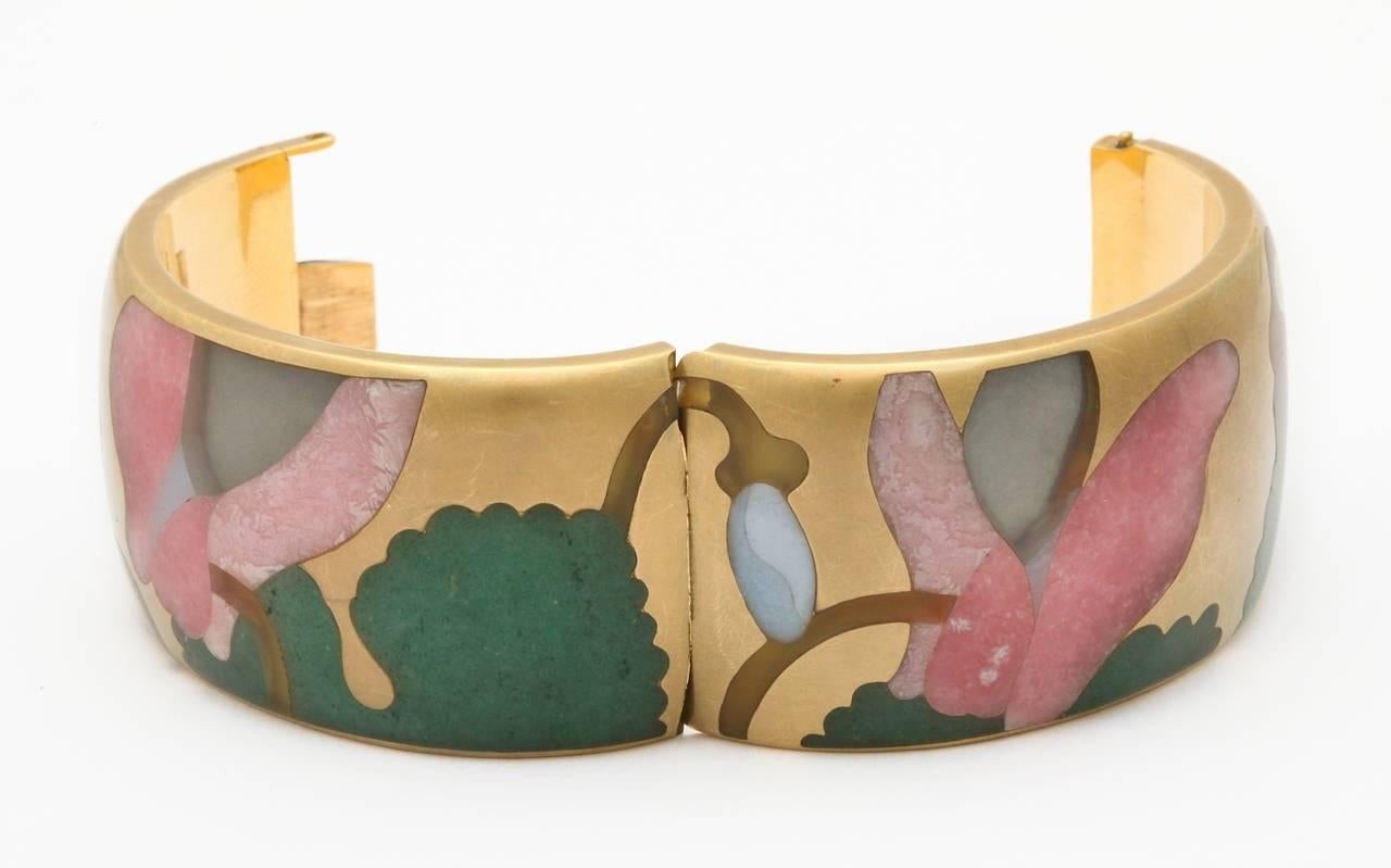 A beautiful 1980s multi-stone inlay masterpiece by tiffany & co., designed by angela cummings. Hand-carved multi-color hard stones including jade, rose quartz, and rock crystal inlaid like a puzzle with interact pieces. The gold surface of the