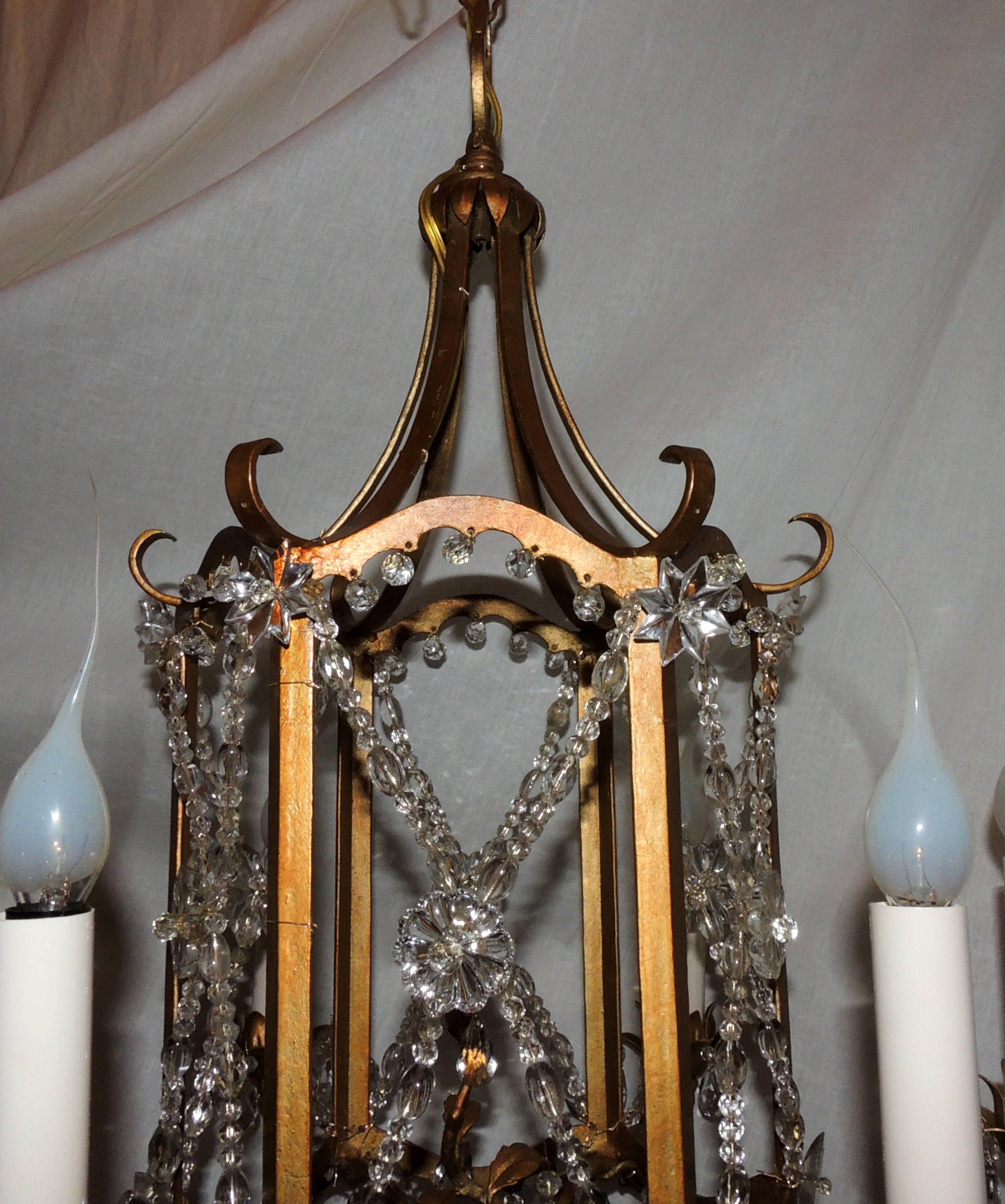 A wonderful French beaded crystal and gold gilt Baguès style, pagoda form six-light chandelier.
   
