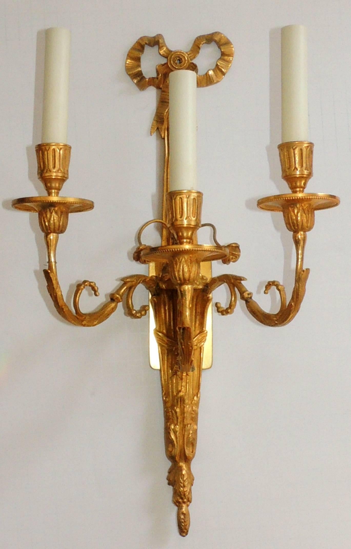 Fine Regency Set Four French Gilt Doré Bronze Bow Top Flower Three-Light Sconces In Good Condition In Roslyn, NY
