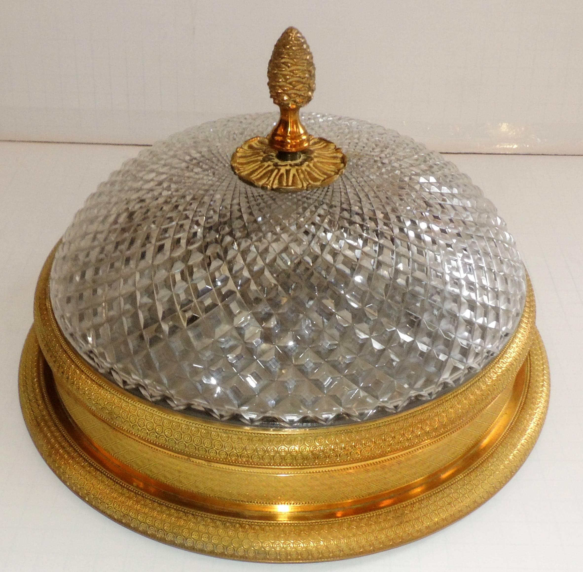 An outstanding neoclassical set of 4 French gilt and chased bronze and diamond cut crystal globe ceiling flush mount chandelier light fixture.

Sold individually.