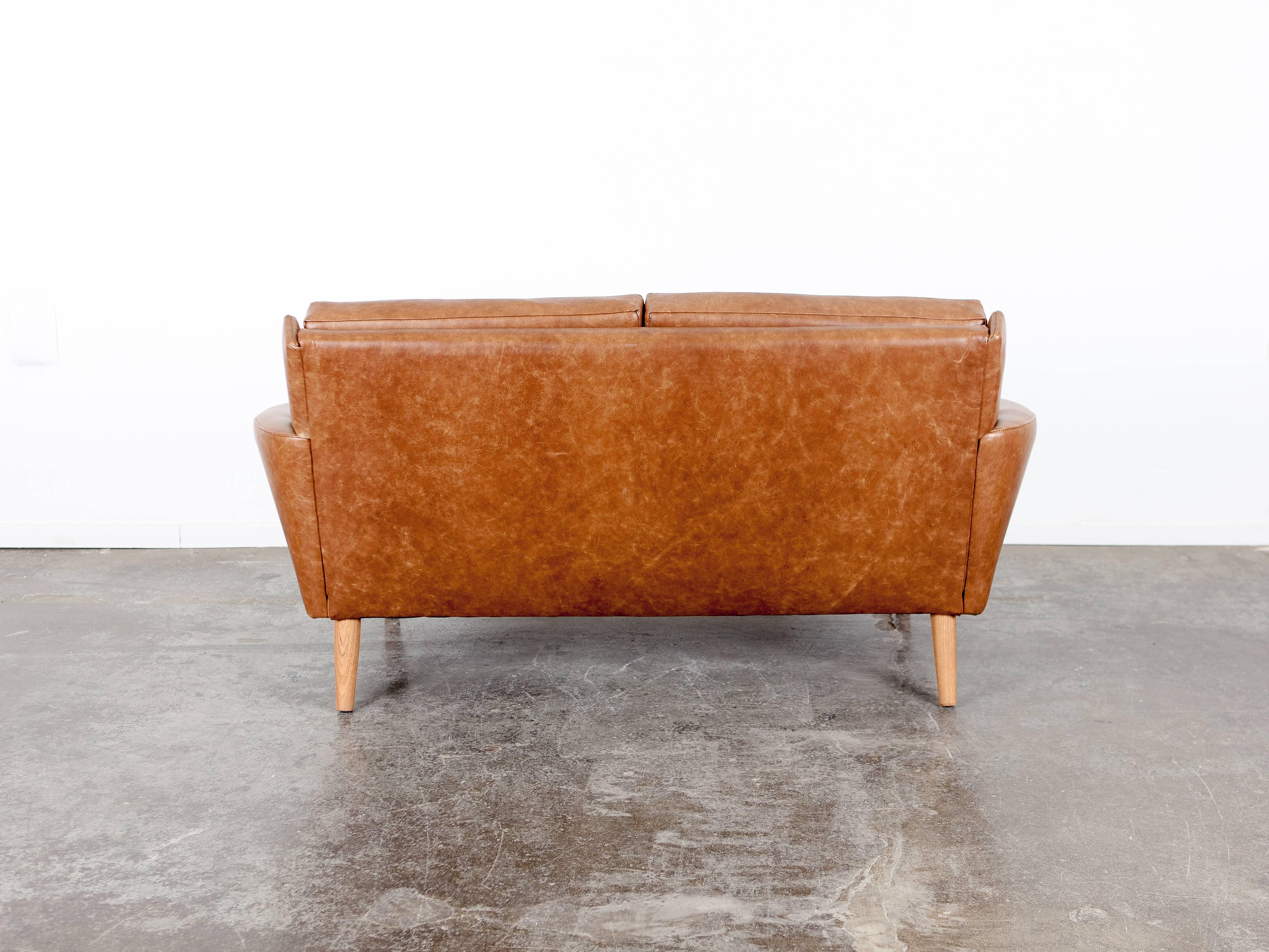 mid century leather loveseat